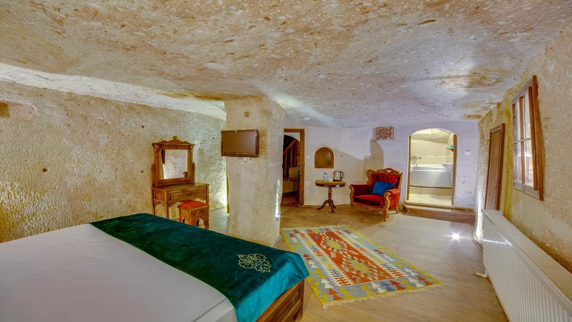 Living room, Bed in Cappadocia Abras Cave Hotel