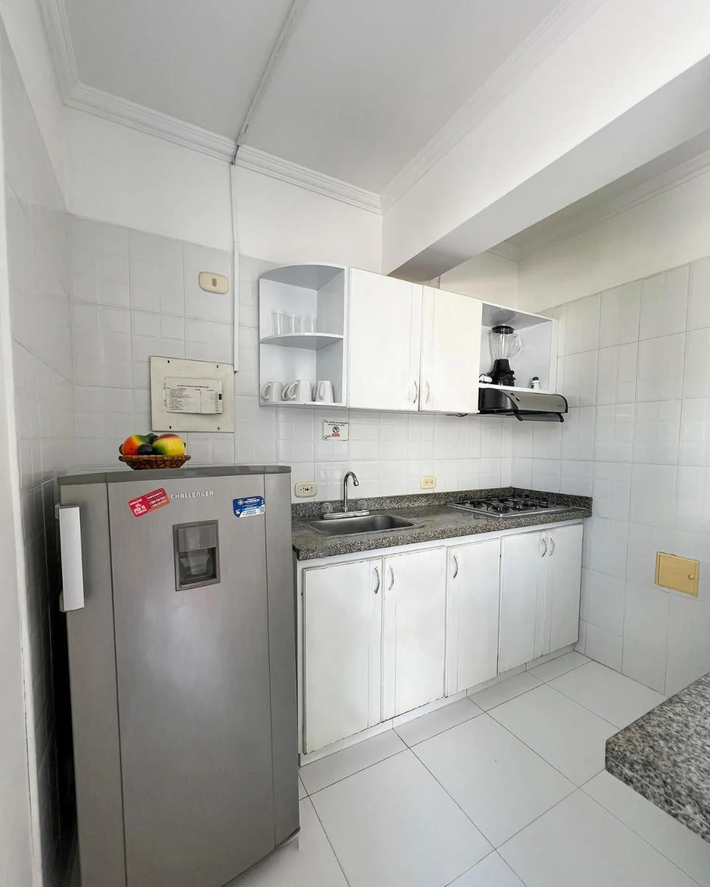 Kitchen or kitchenette in Apartamentos Playa Rodadero