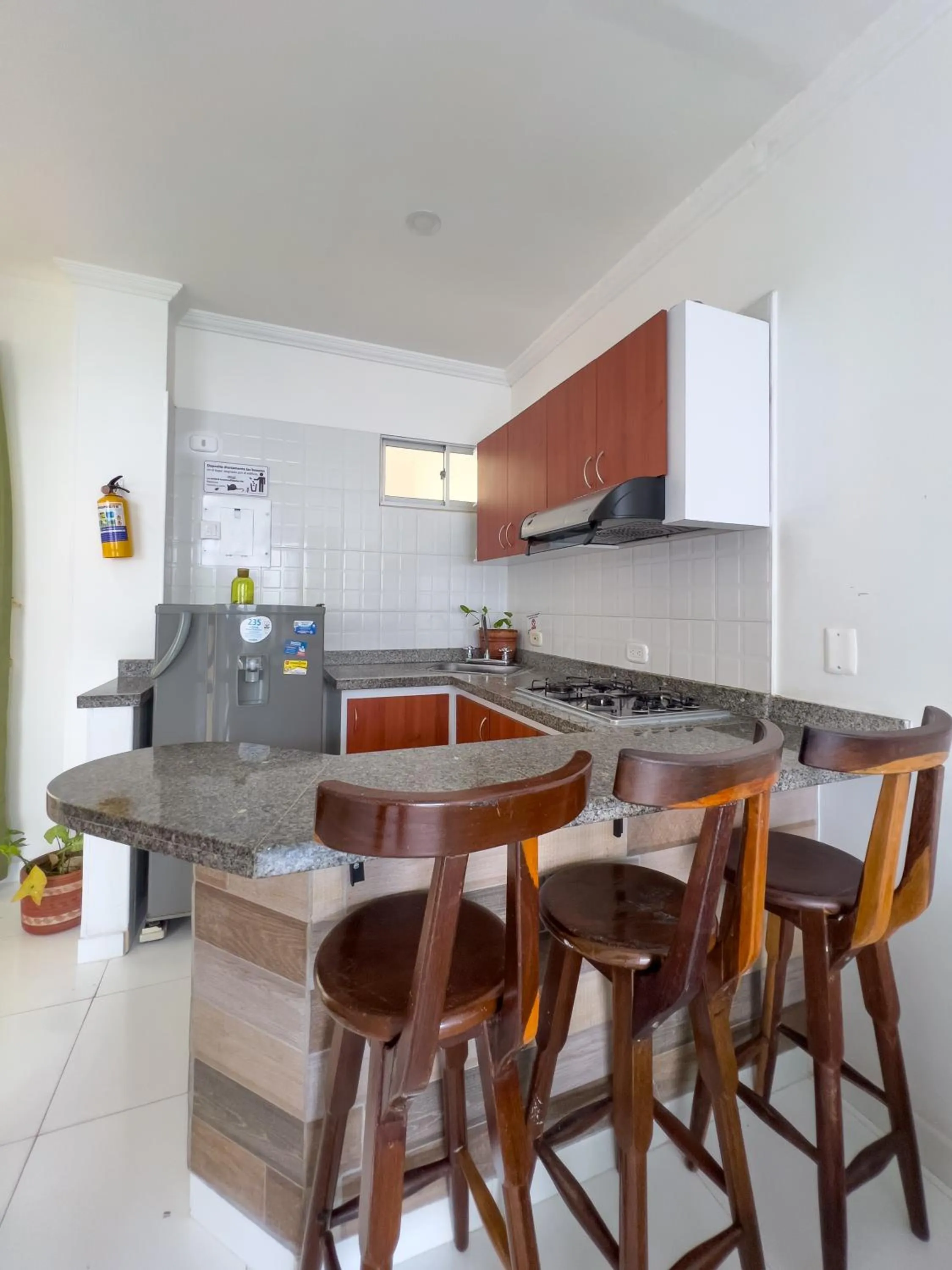 Kitchen or kitchenette in Apartamentos Playa Rodadero