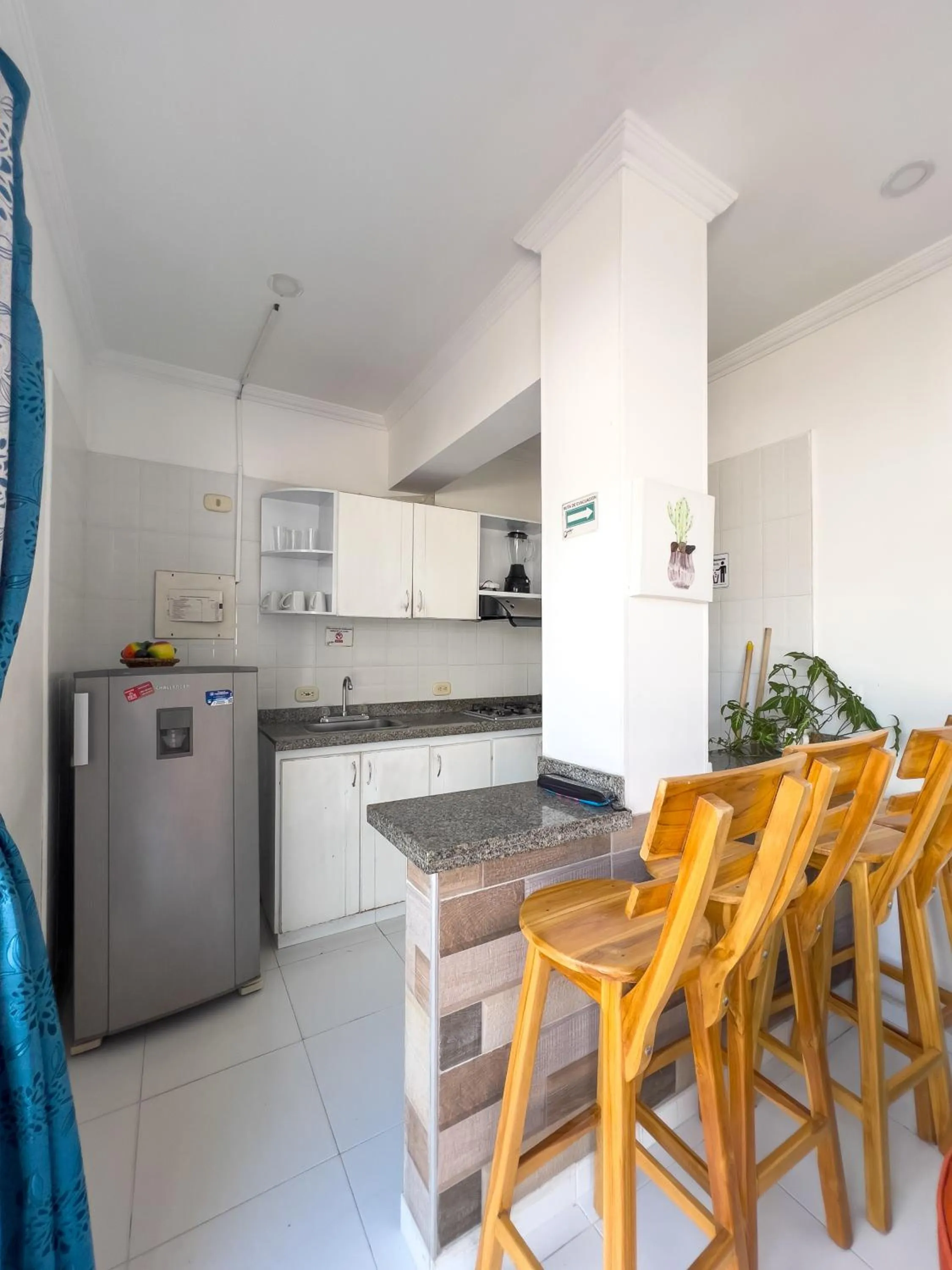 Kitchen or kitchenette in Apartamentos Playa Rodadero