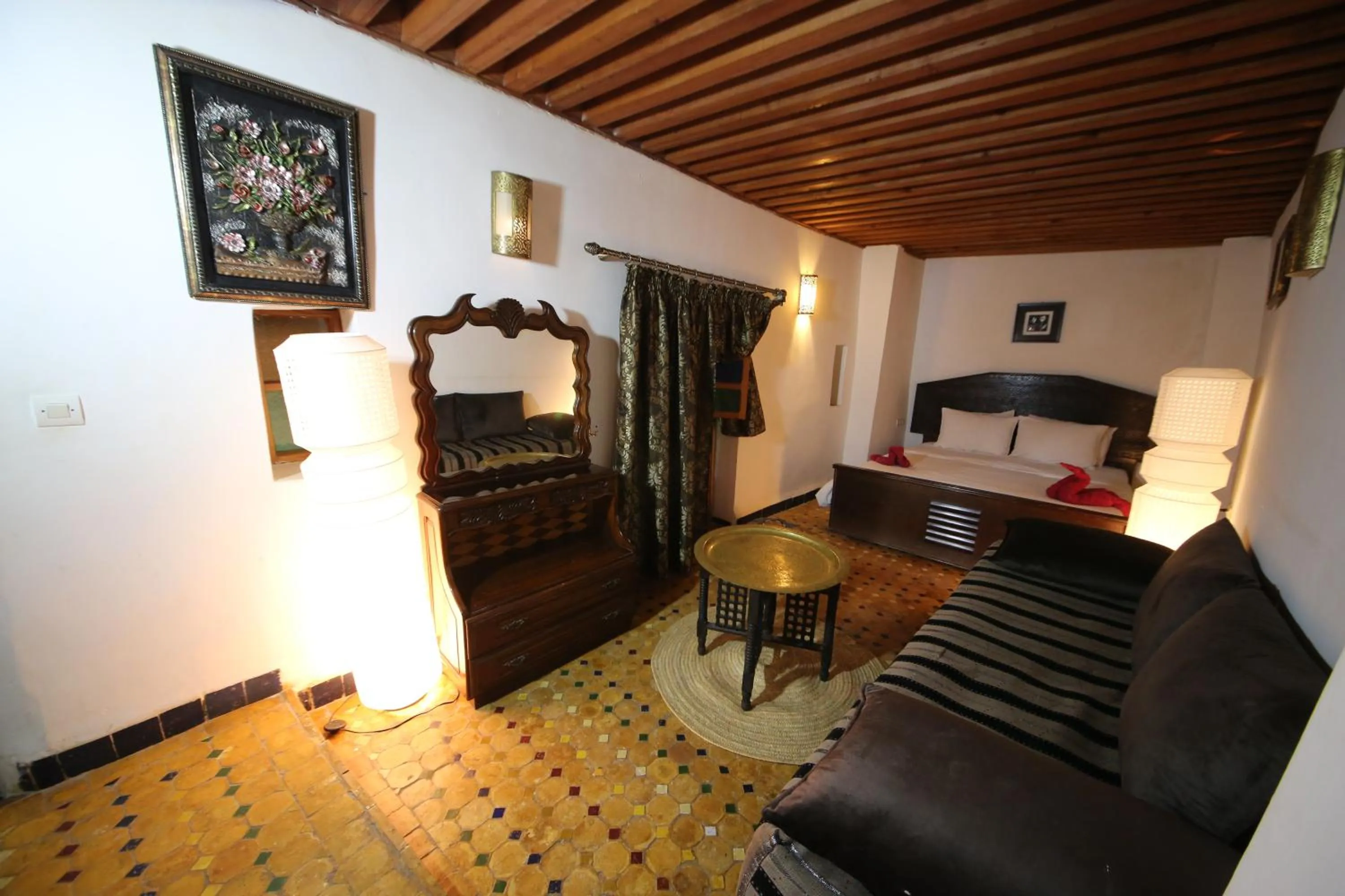 Bed in Riad Zina Fes - Elegance in the Heart of Fes