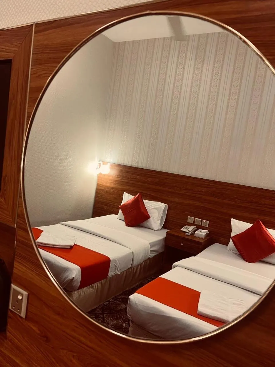 Bed in Parasol Hotel