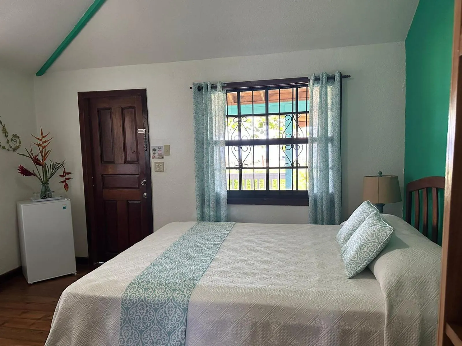 Bed in Seagrape Plantation Resort & Dive Center