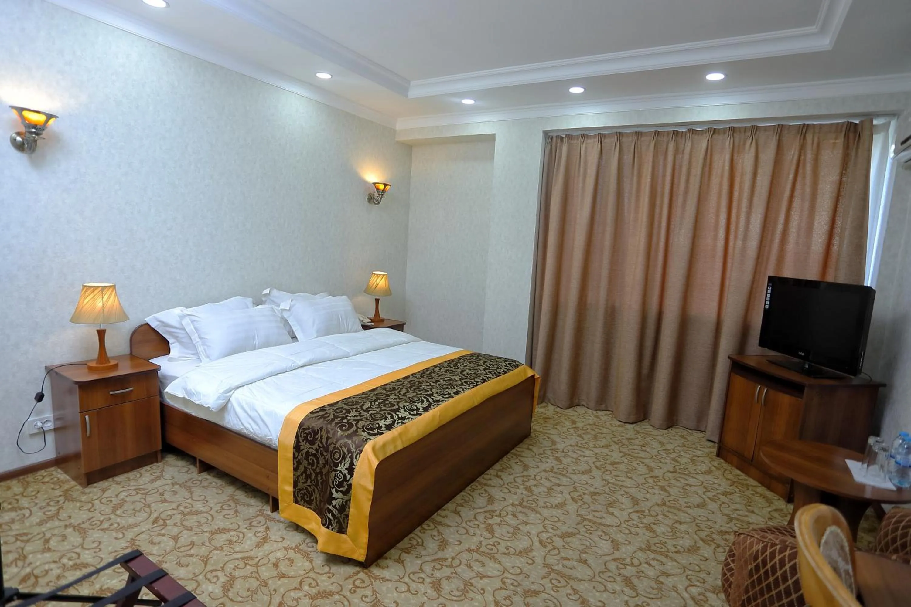Bed in VIARDO Hotel