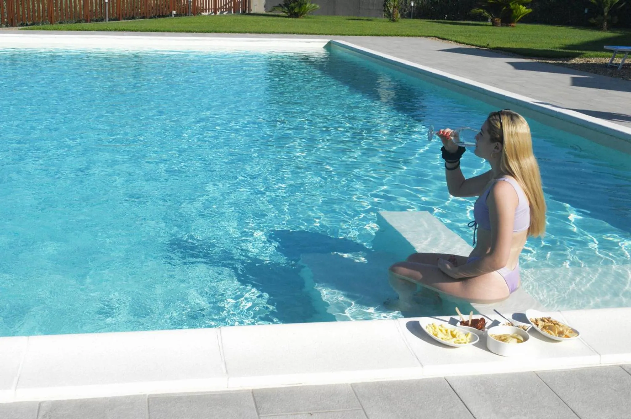 Swimming pool in Mauro Home Bed and Relax