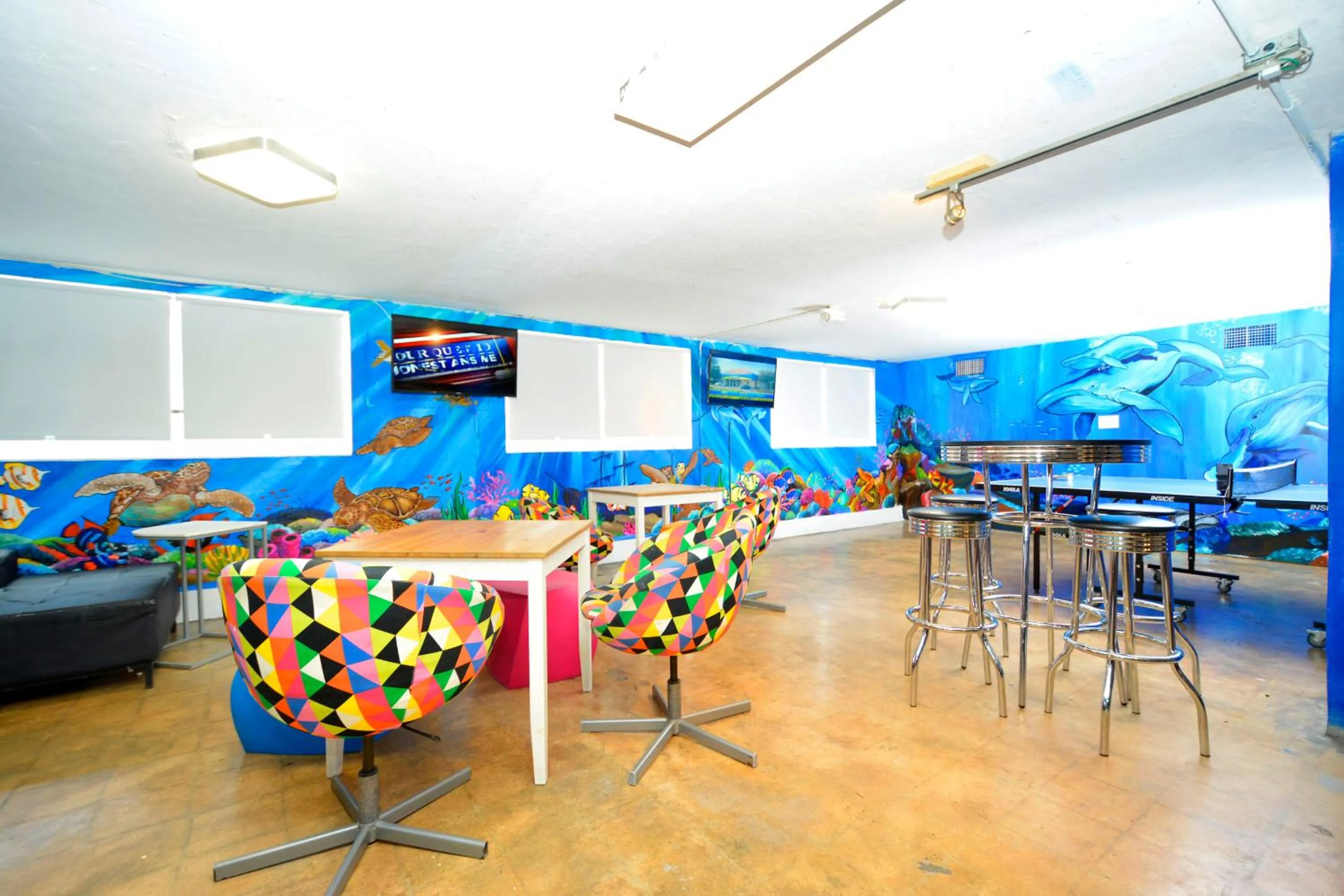 TV and multimedia in South Beach Rooms and Hostel