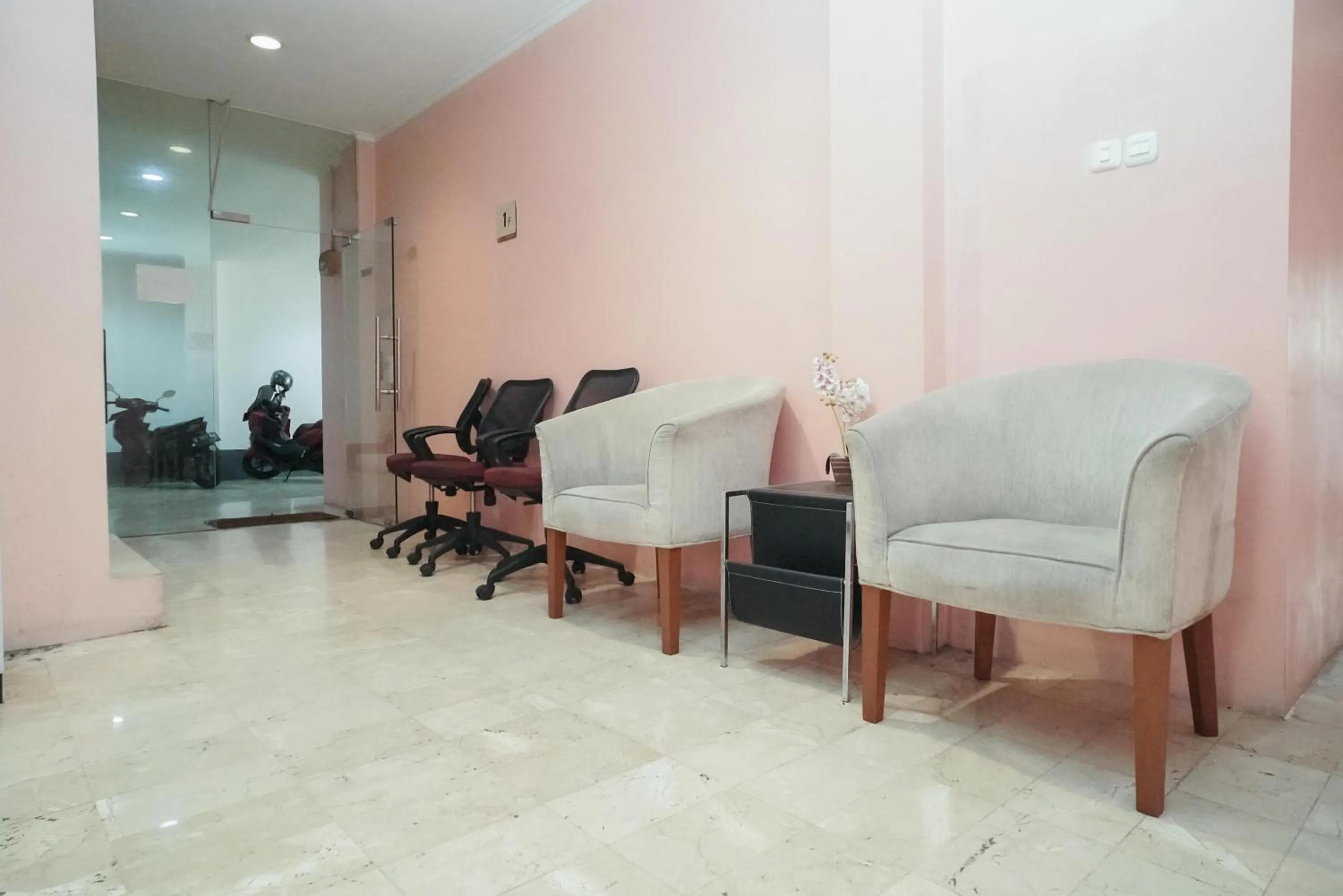 Seating area in KoolKost near Universitas BINUS Anggrek