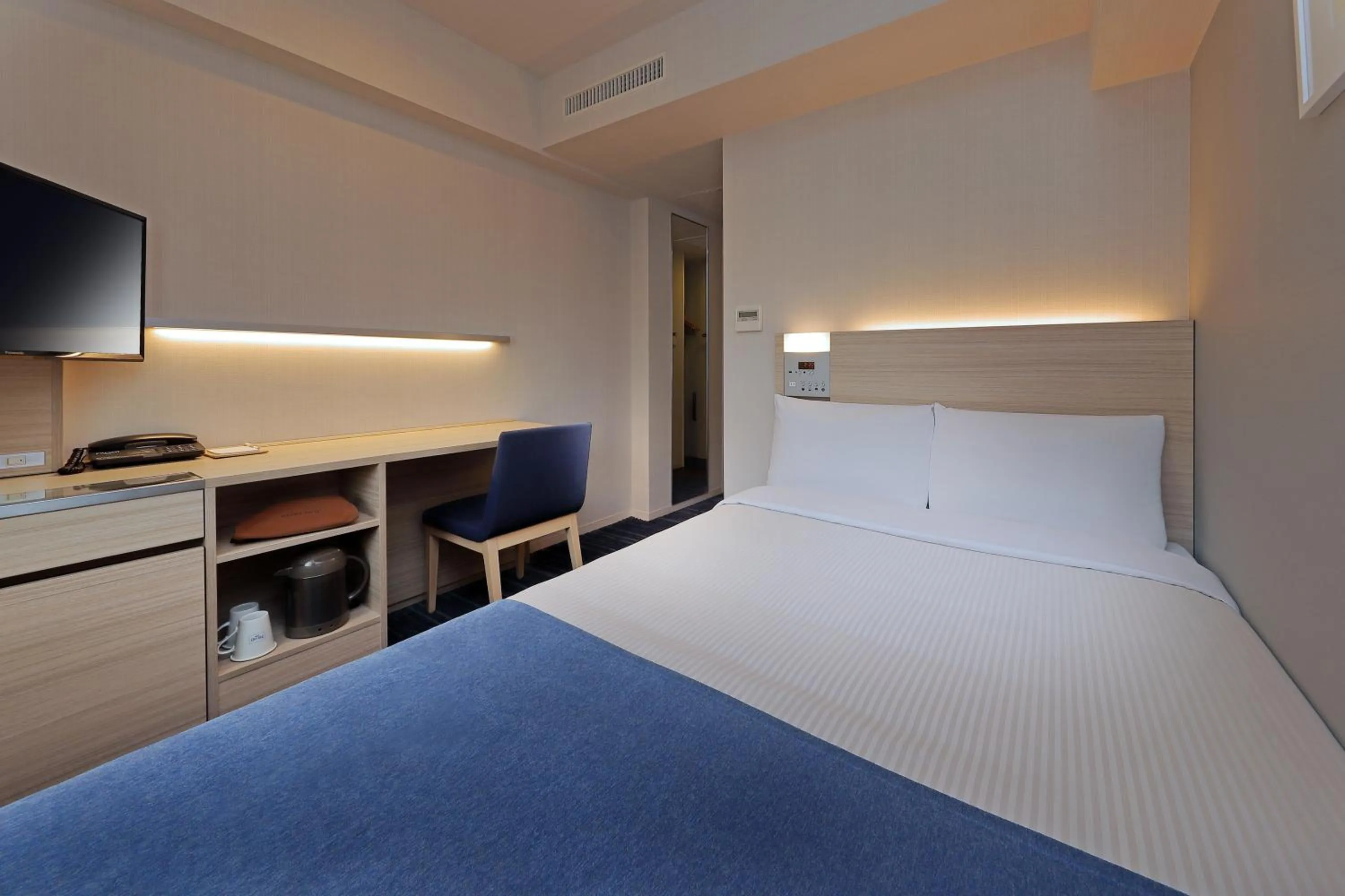 Bed in Keio Presso Inn Gotanda