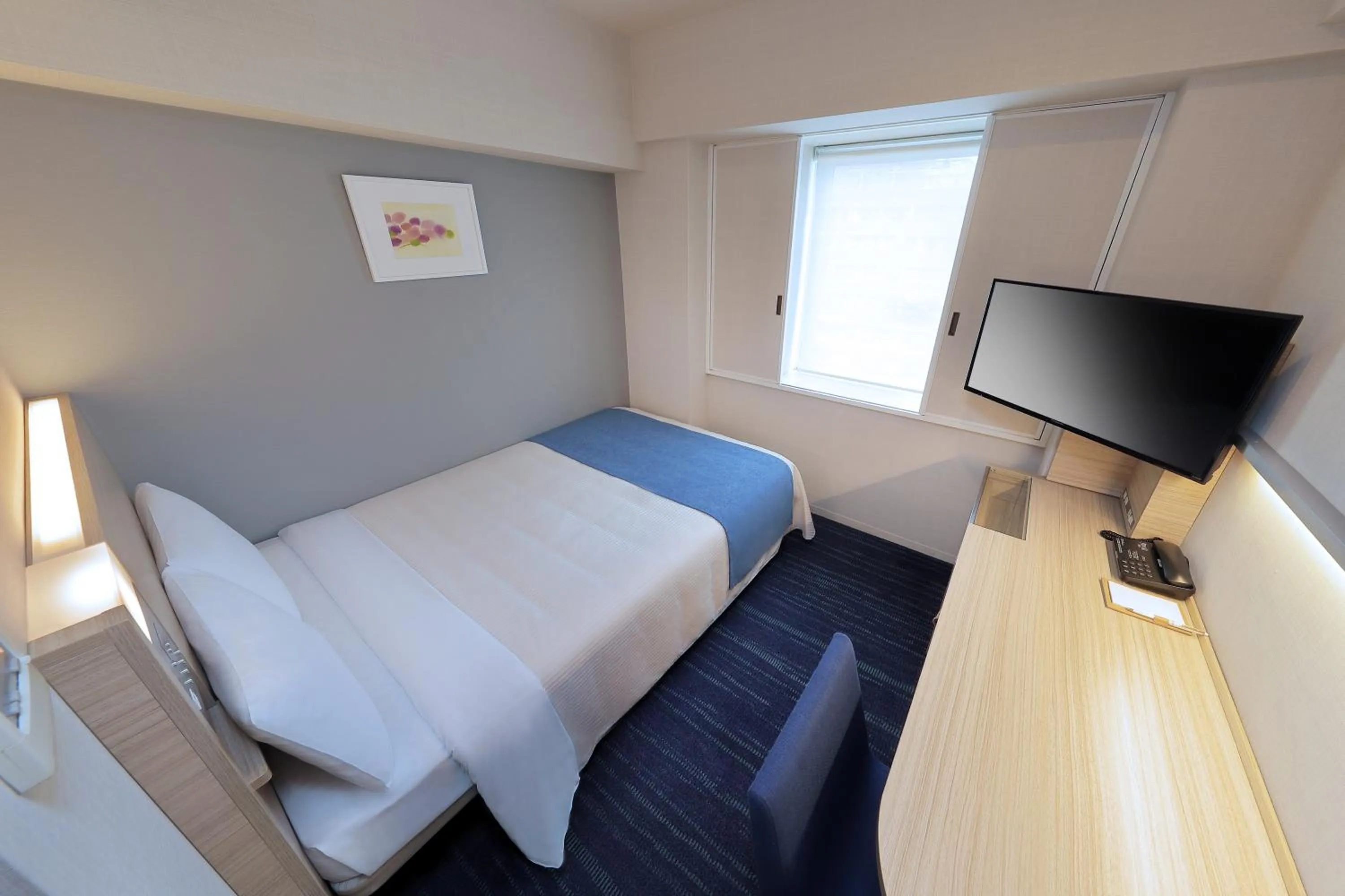 Bed in Keio Presso Inn Gotanda
