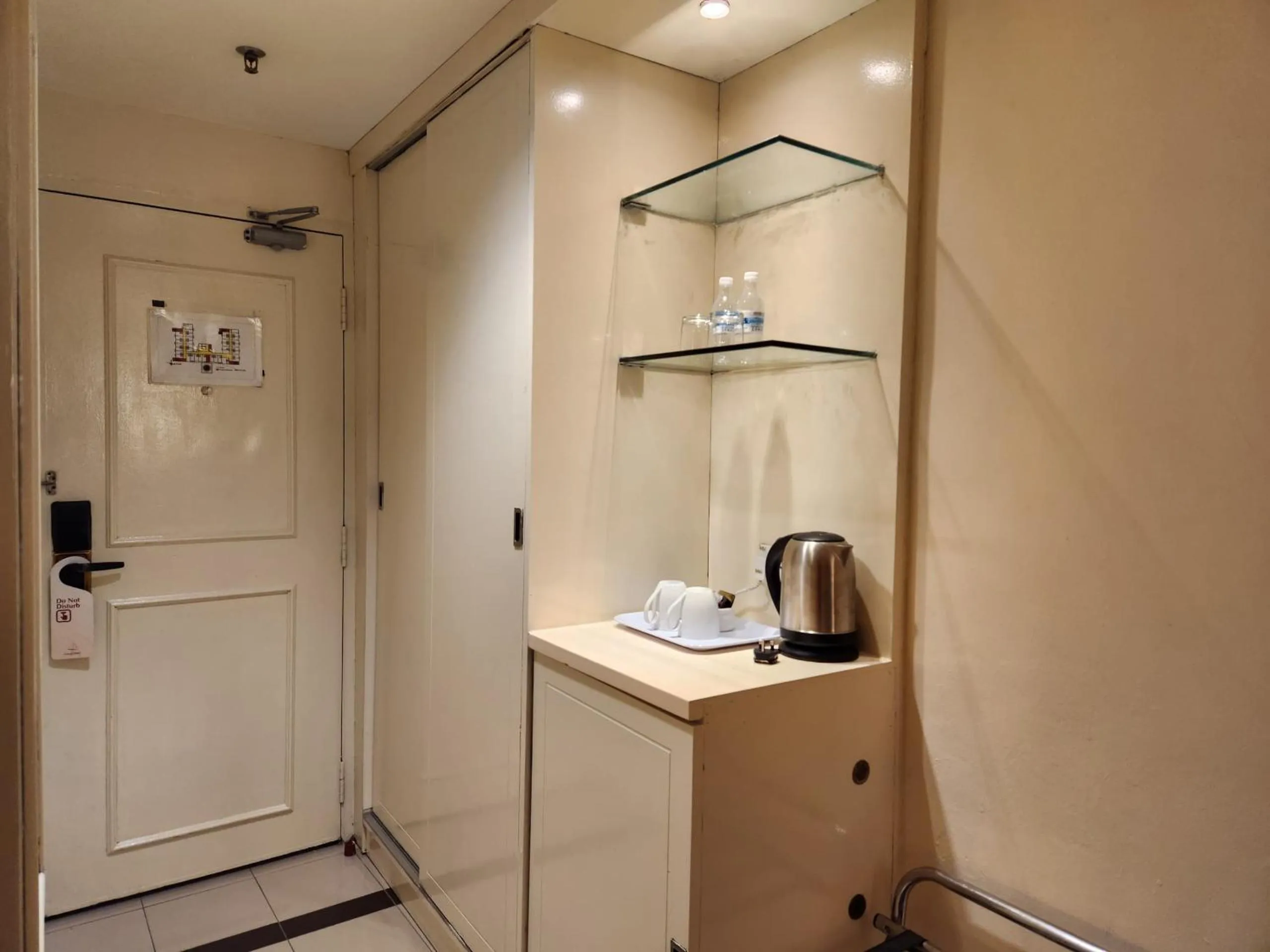 Bedroom in The Grand Puteri Hotel