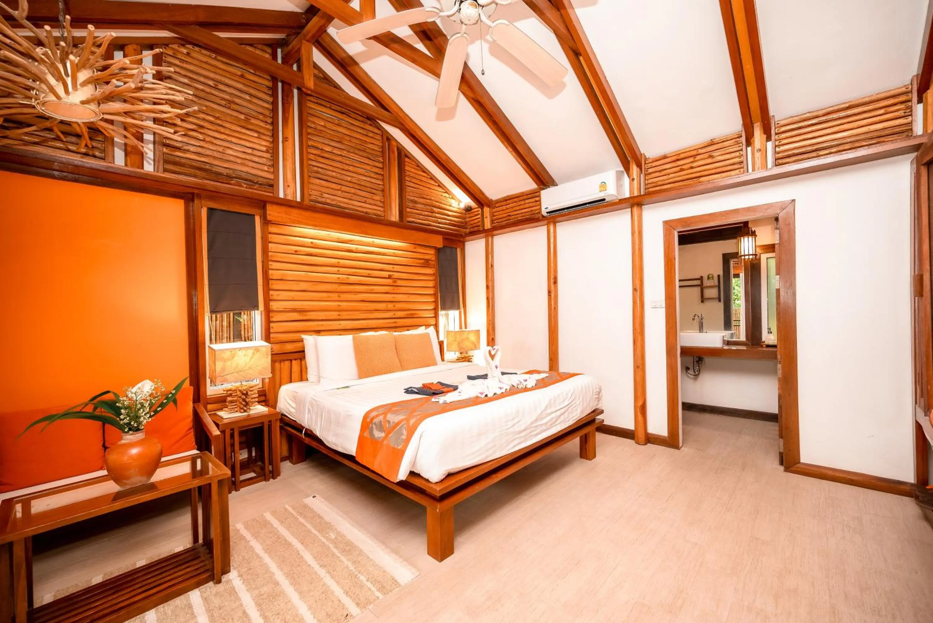 Bed in Home Phutoey River Kwai Hotspring & Nature Resort