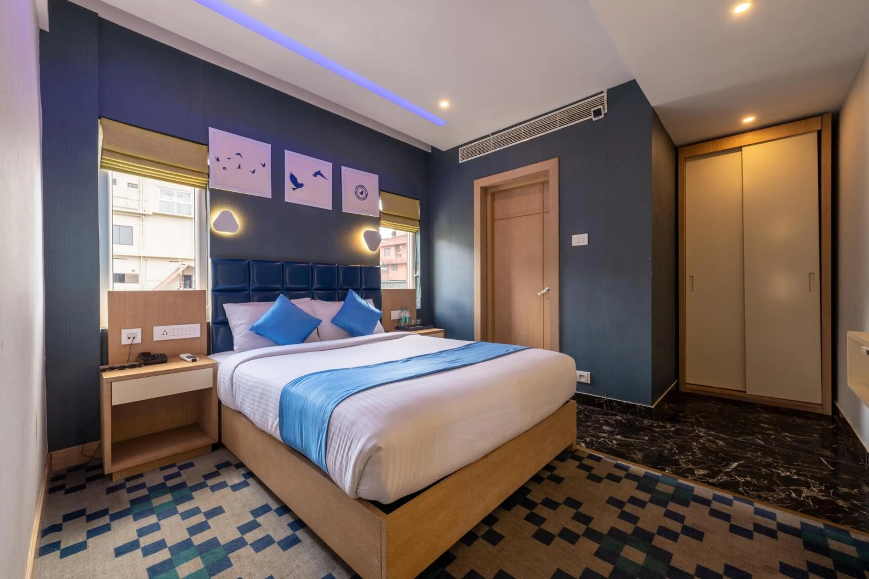 Photo of the whole room, Bed in Mintotel Wayanad