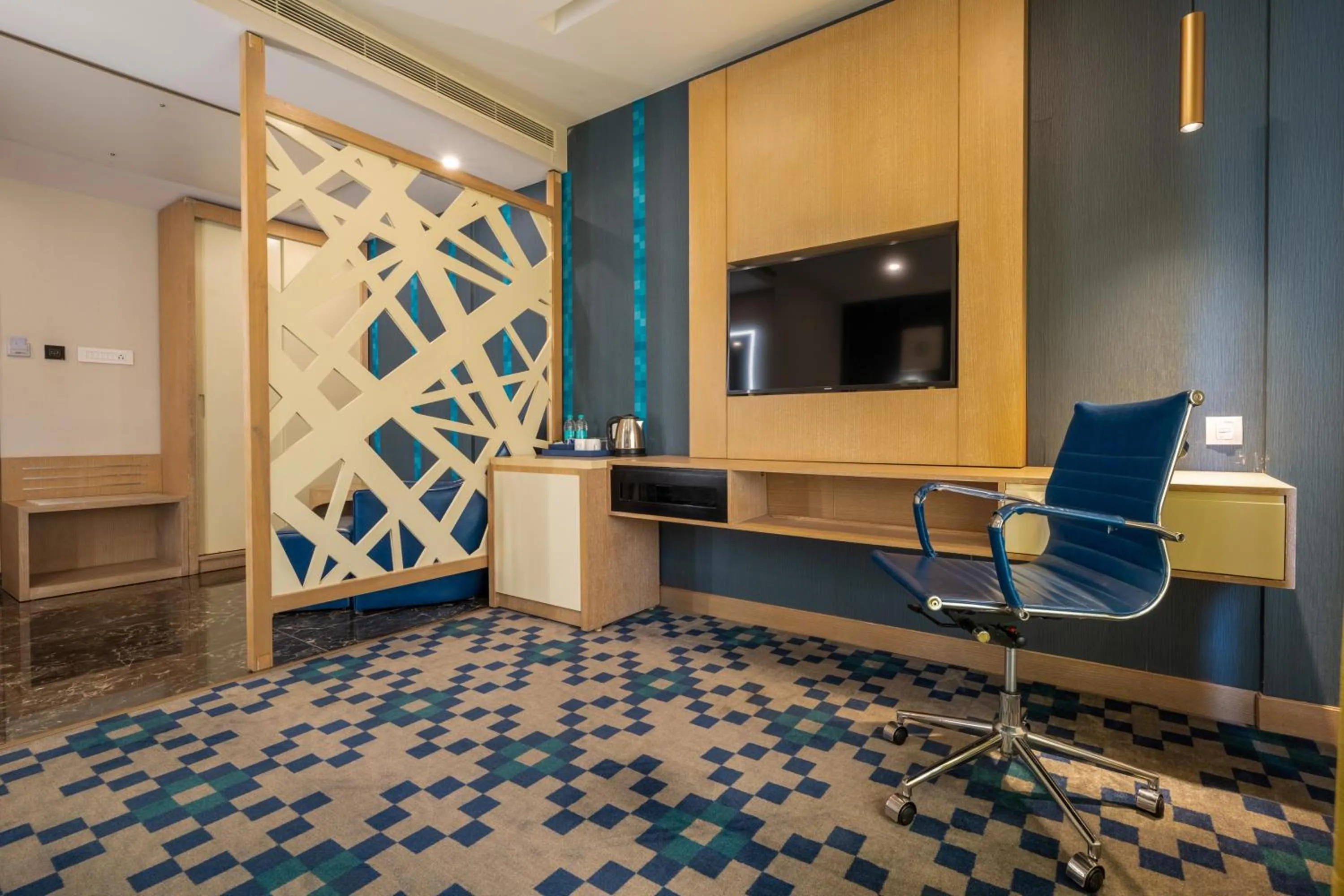 TV and multimedia, Bed in Mintotel Wayanad