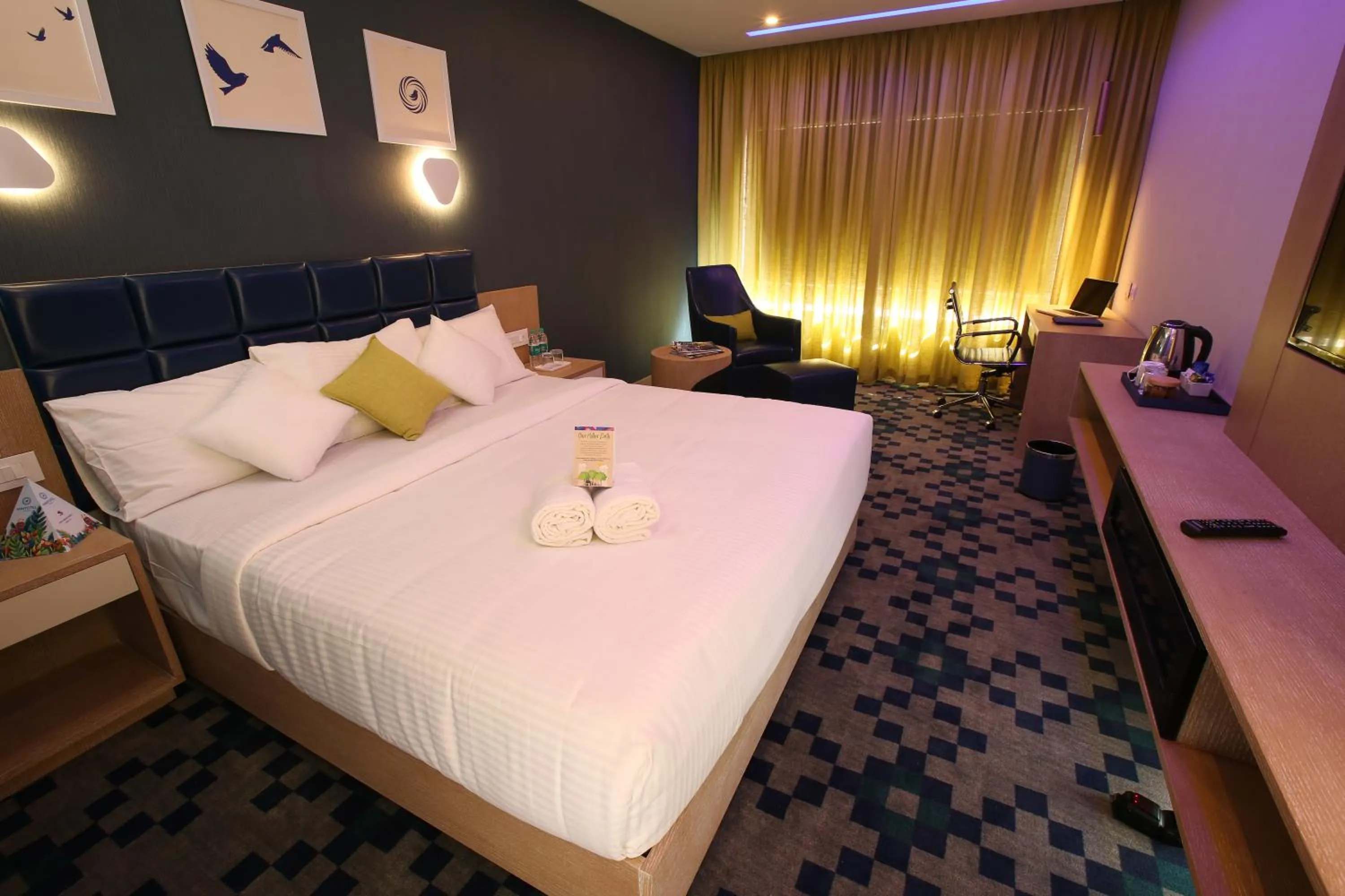 Photo of the whole room, Bed in Mintotel Wayanad