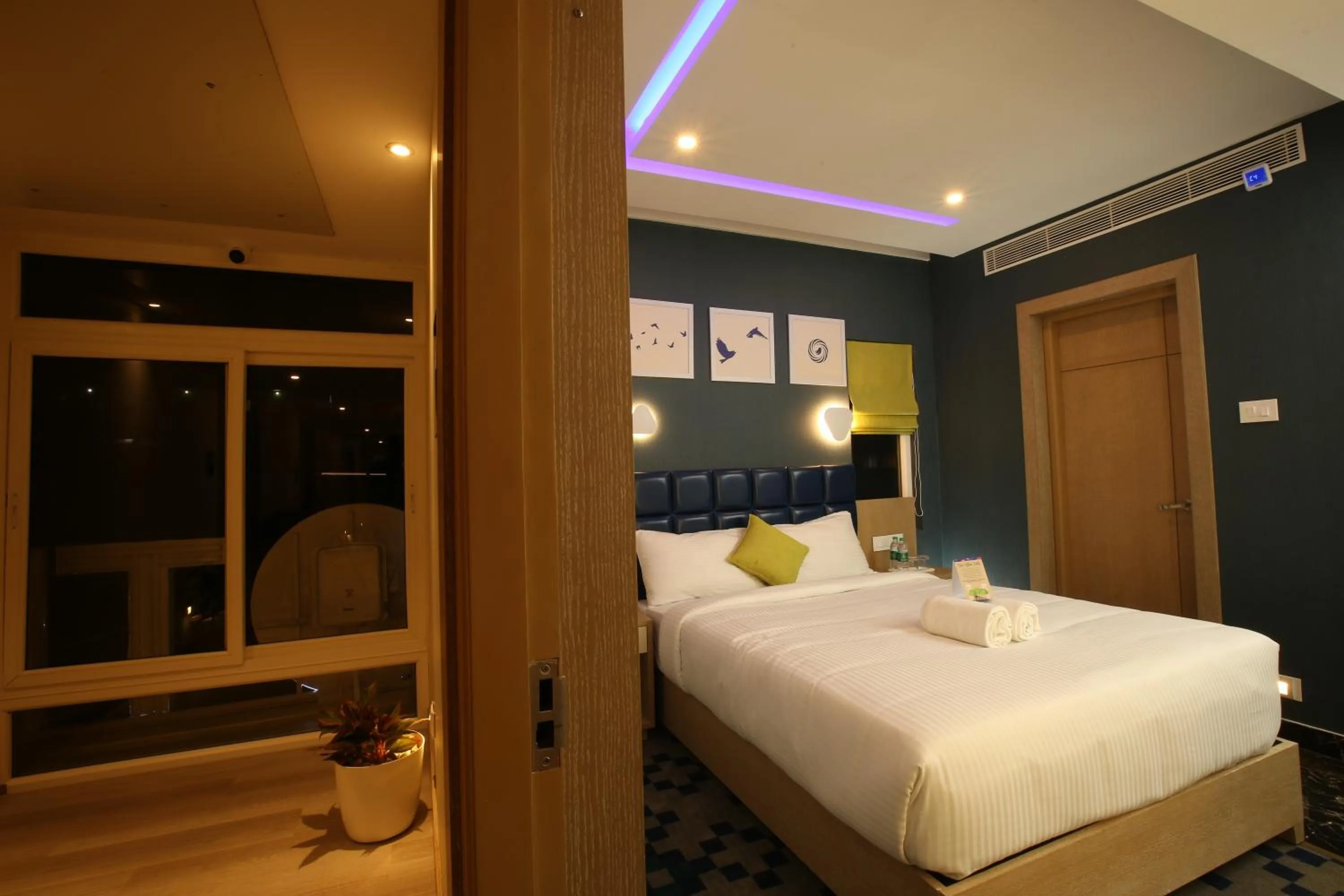 Photo of the whole room, Bed in Mintotel Wayanad