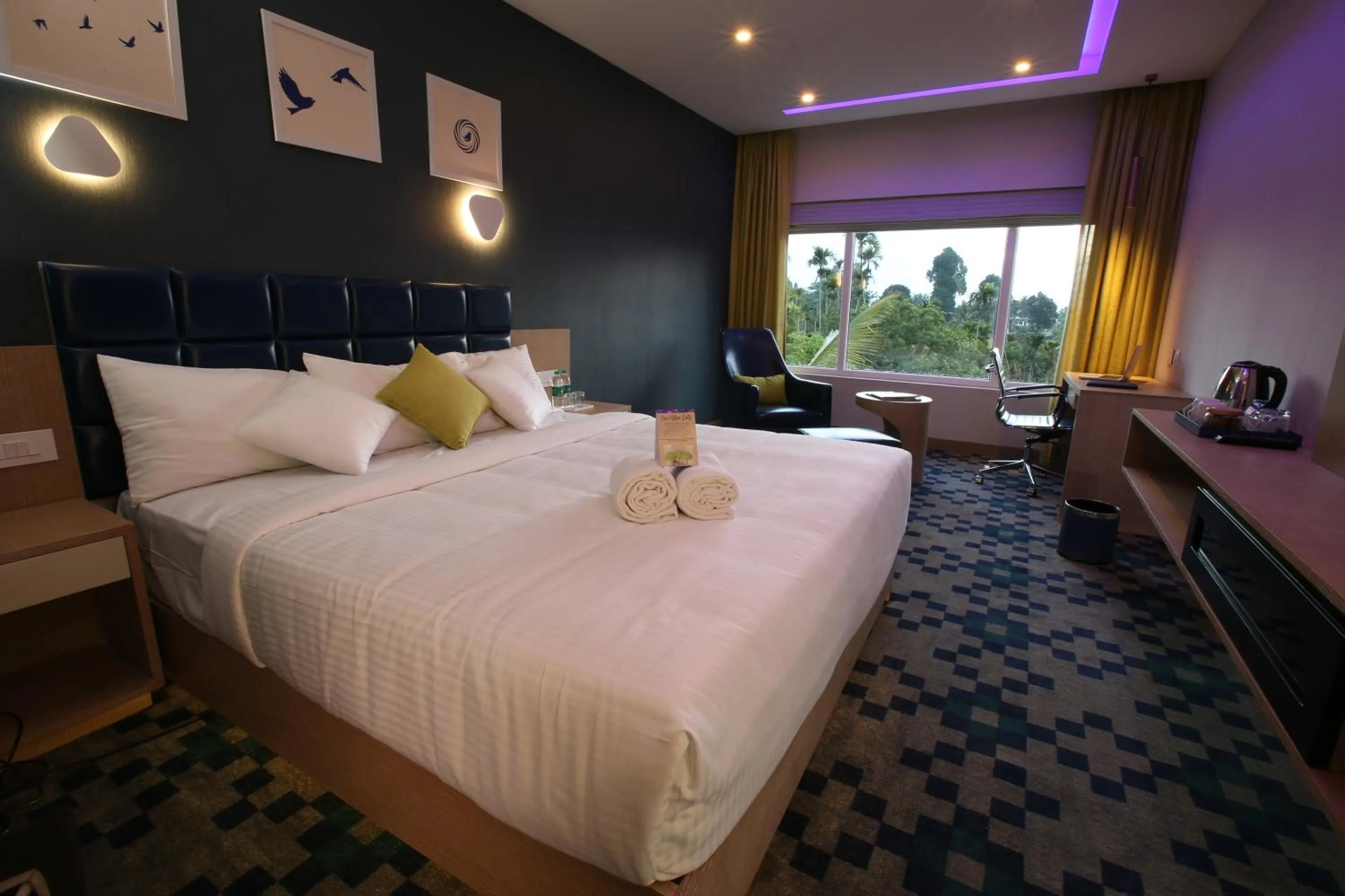 Bed in Mintotel Wayanad