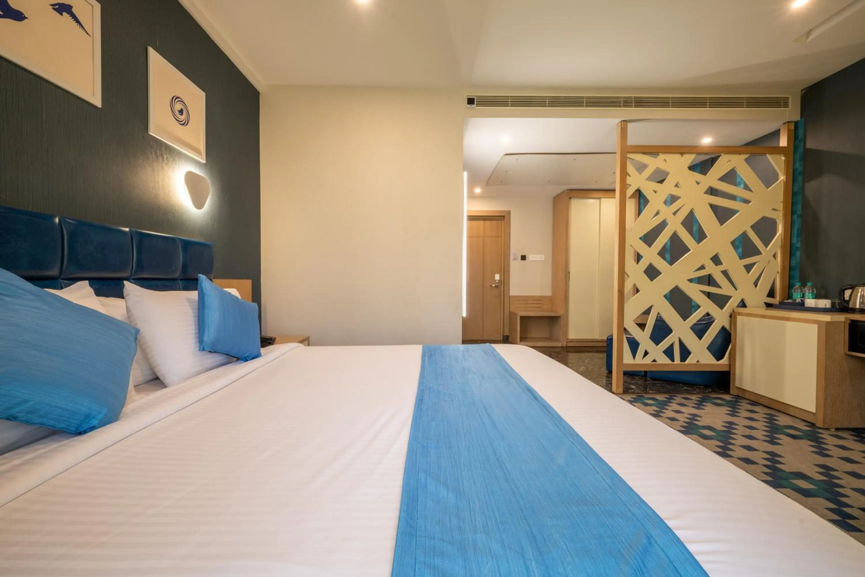 Bed in Mintotel Wayanad