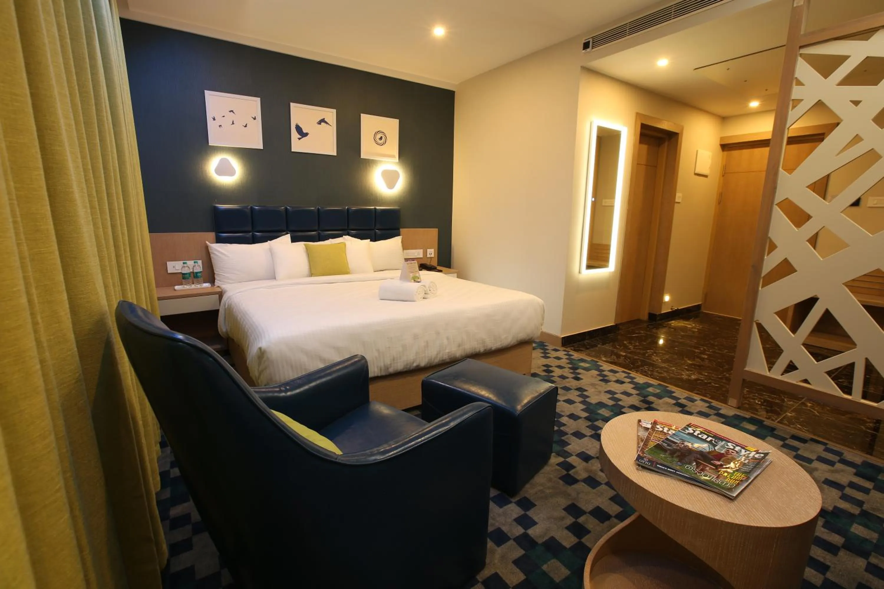 Bed in Mintotel Wayanad