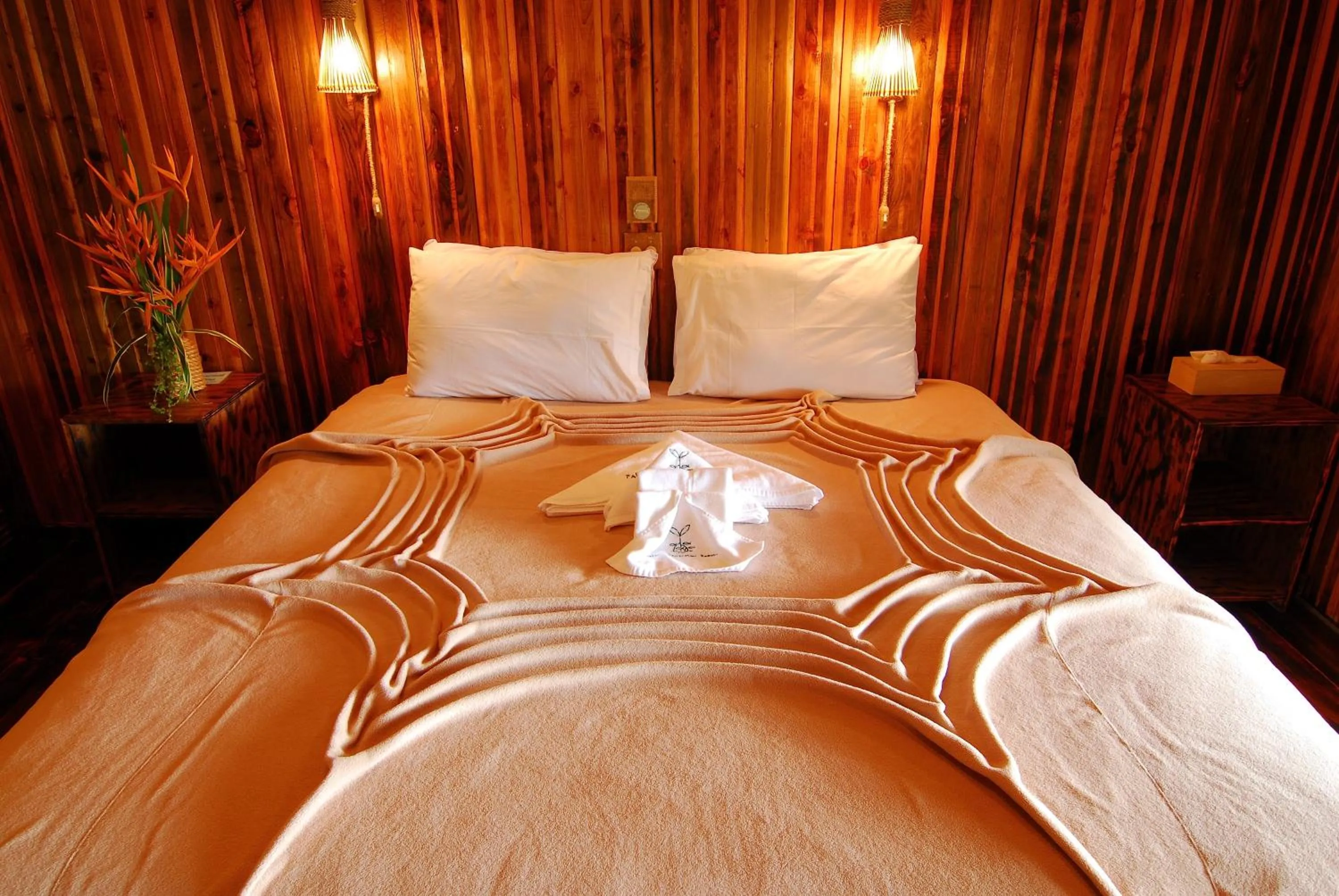 Bed in Palau Plantation Resort