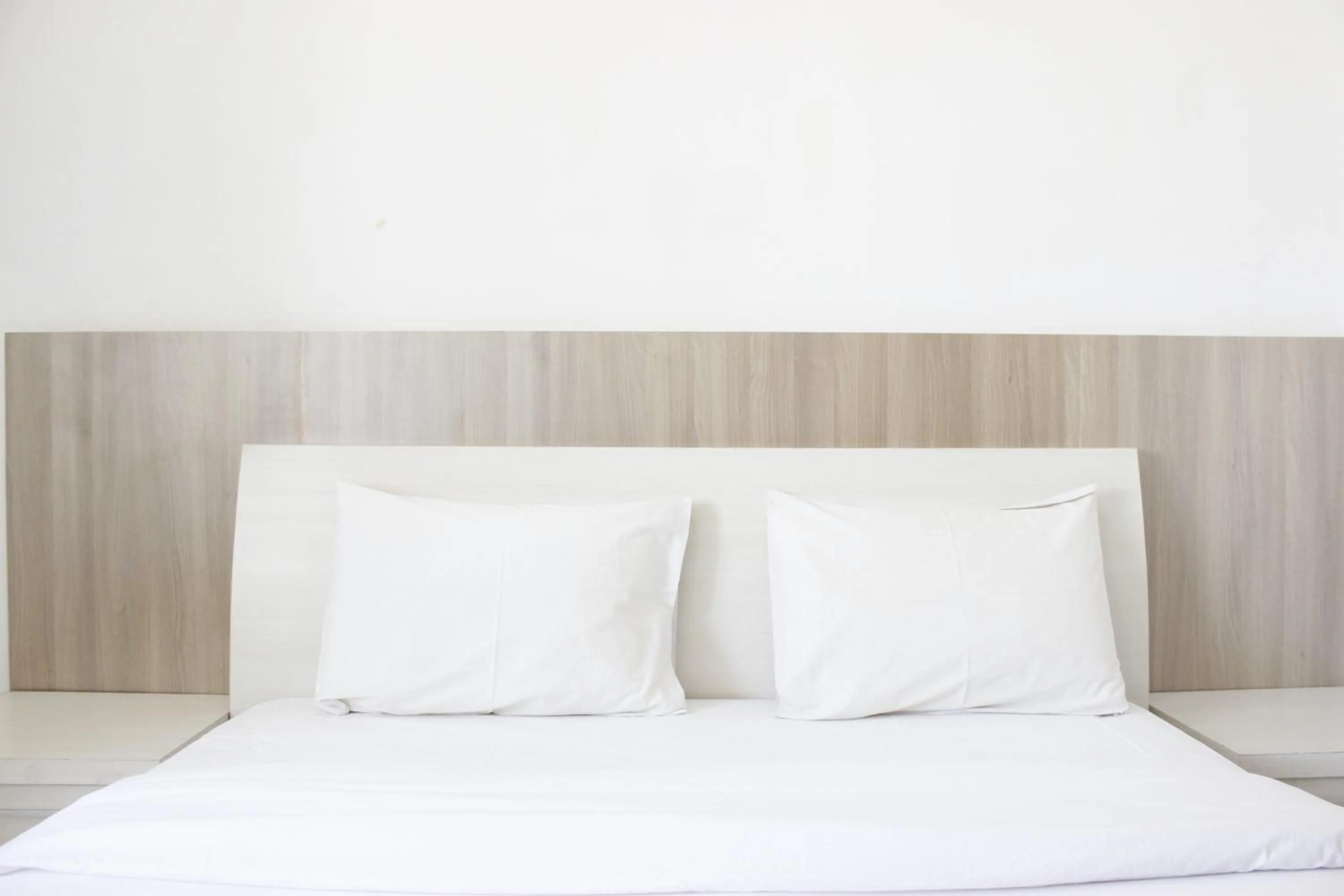 Bedroom, Bed in Minimalist Studio Apartment at The Suite @Metro By Travelio