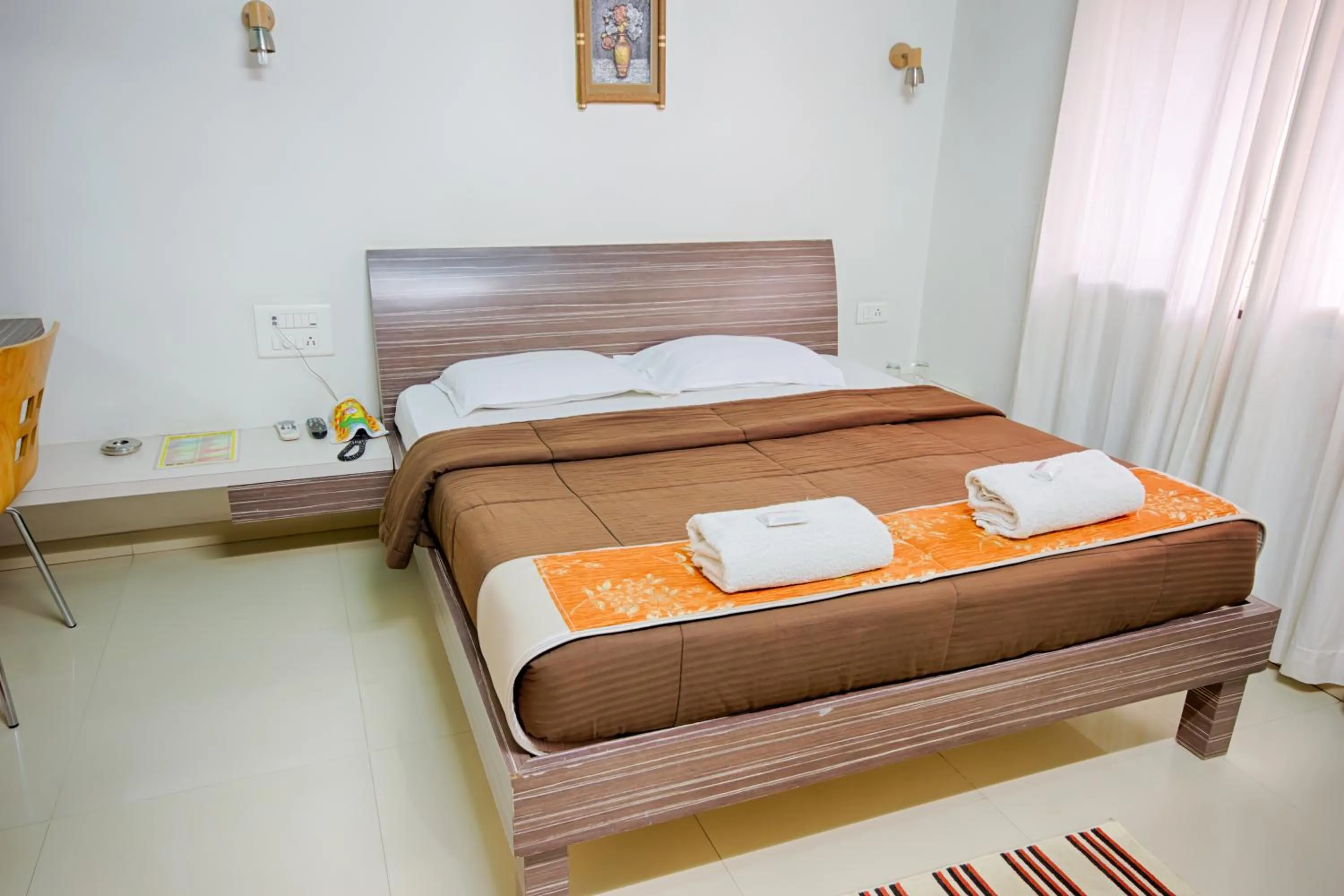 Bed in Hotel Grand Ashwin