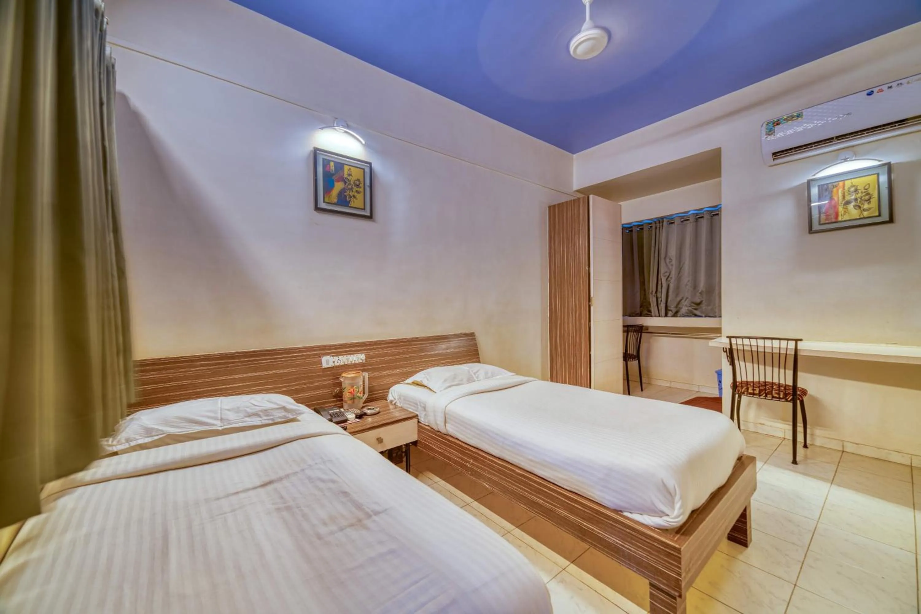 Bed in Hotel Grand Ashwin