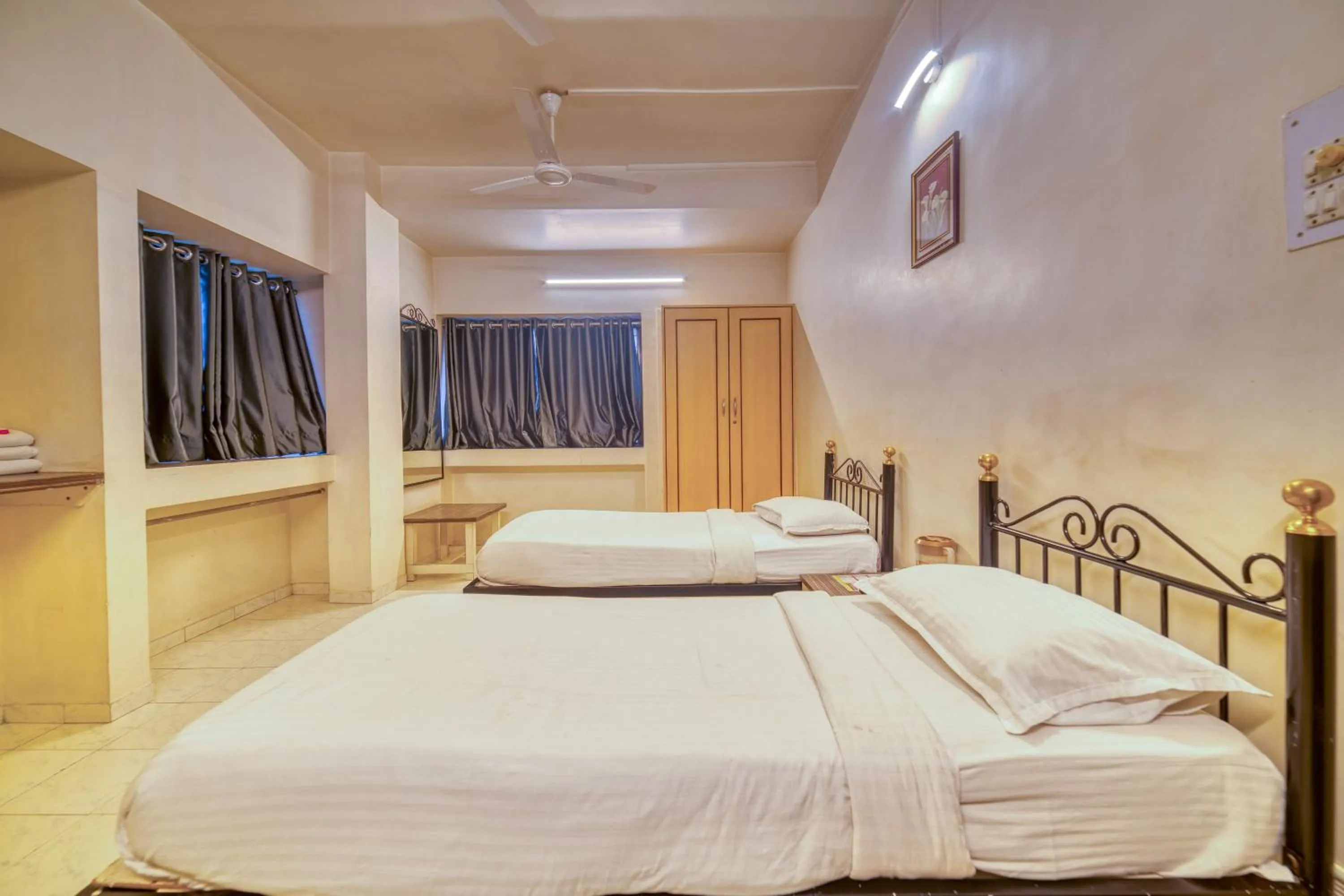 Bed in Hotel Grand Ashwin
