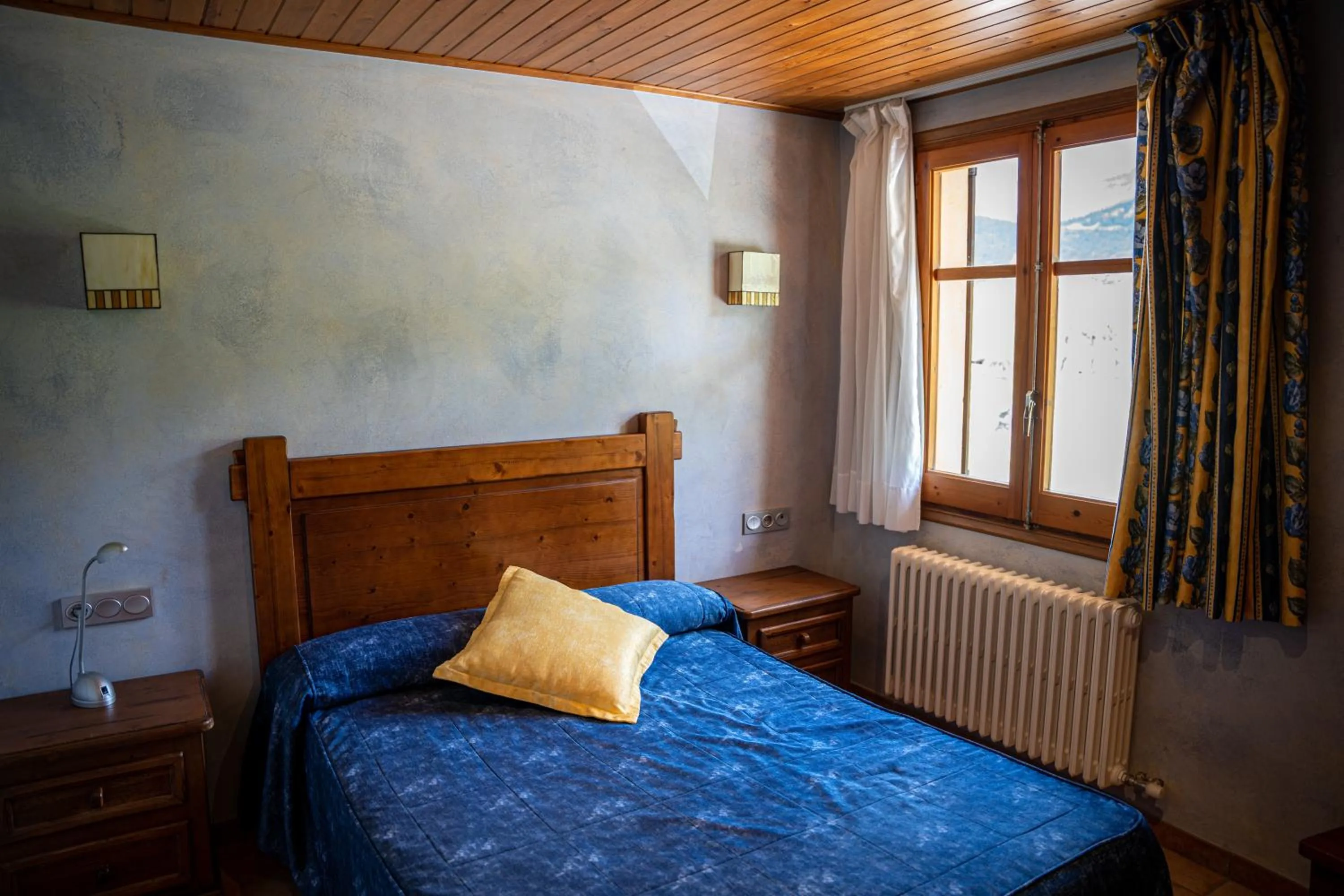 Bed in Hostal Cal Franciscó