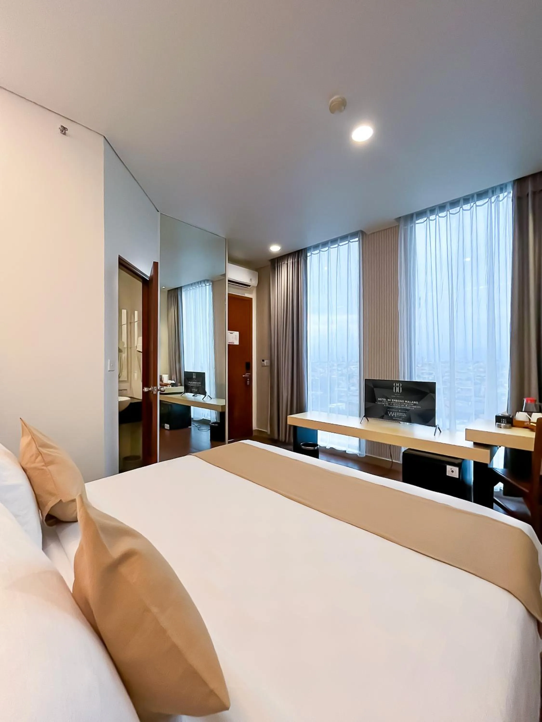 Bedroom, Bed in Hotel 88 Embong Malang Tunjungan Surabaya by WH - Breakfast with The Best View on The Highest Floor and Strategic Location in The City Center