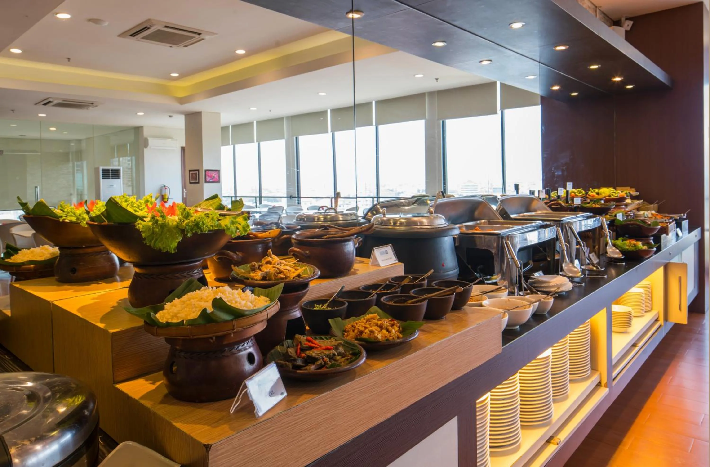 Buffet breakfast in Hotel 88 Embong Malang Tunjungan Surabaya by WH - Breakfast with The Best View on The Highest Floor and Strategic Location in The City Center