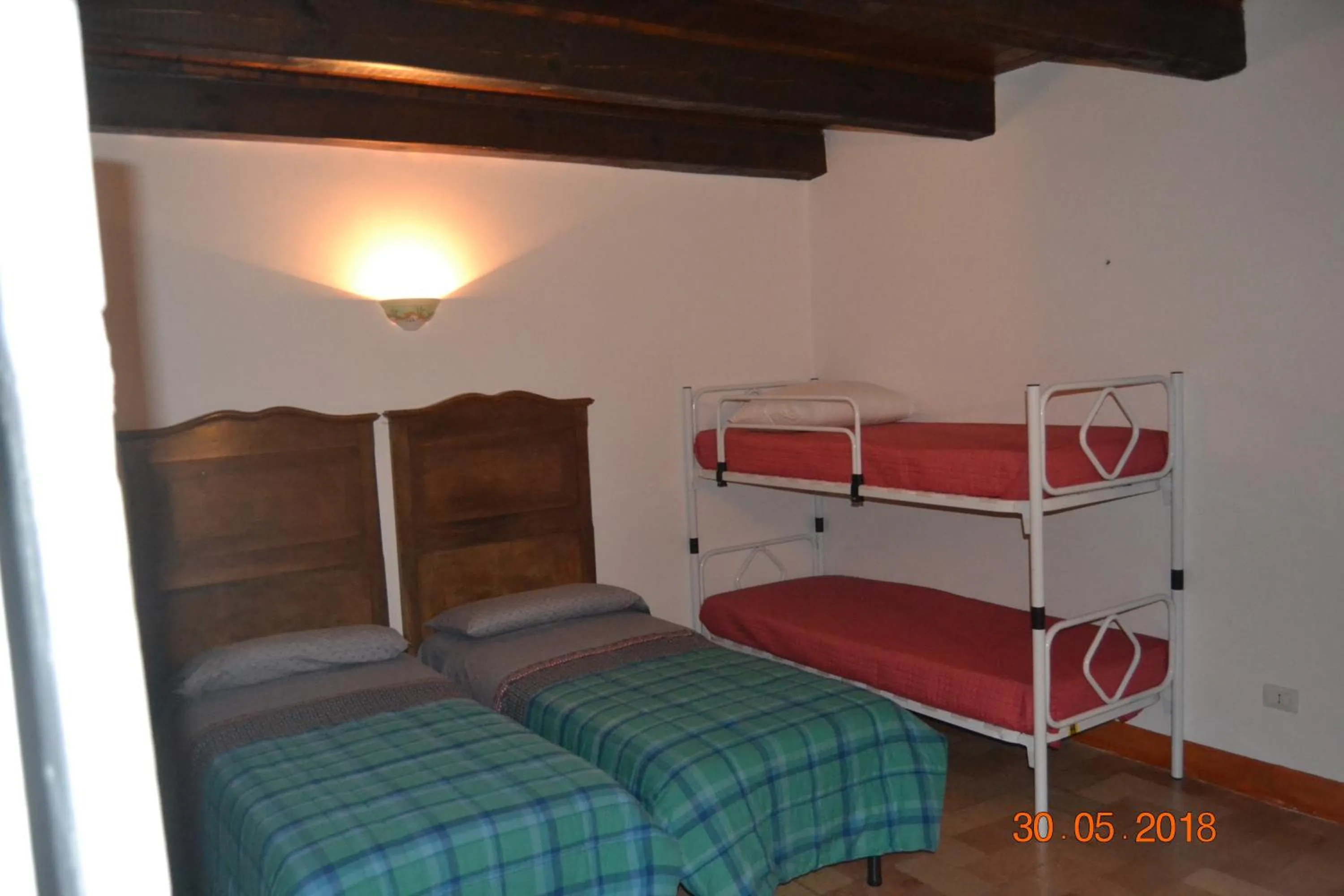 Bed in Affitta Camere Il Pettirosso