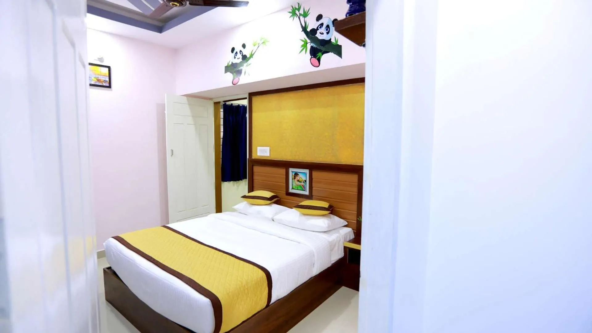Bed in Base9 Cochin Airport Hotel