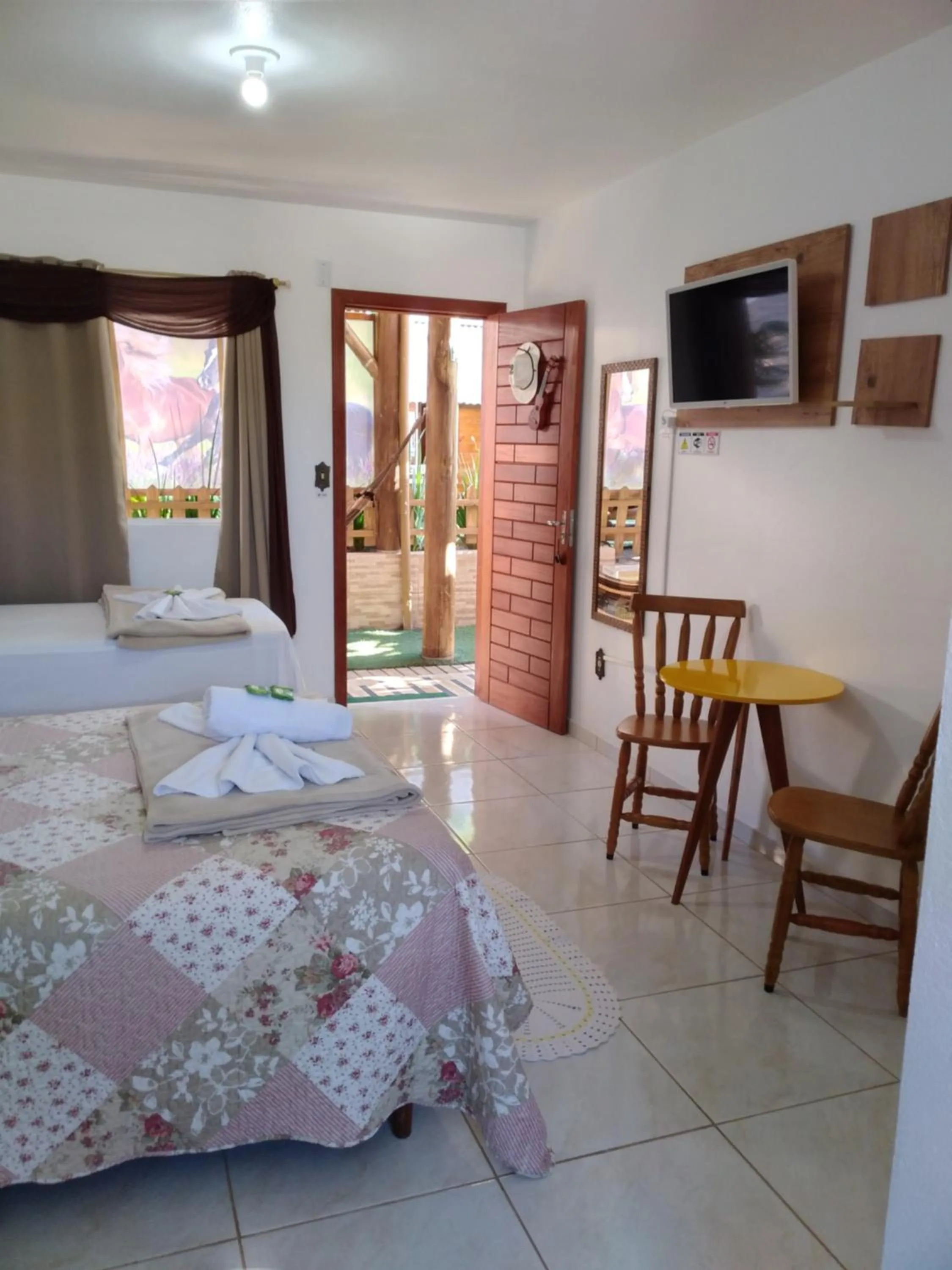 Bed in Pousada Alegria do Cowboy