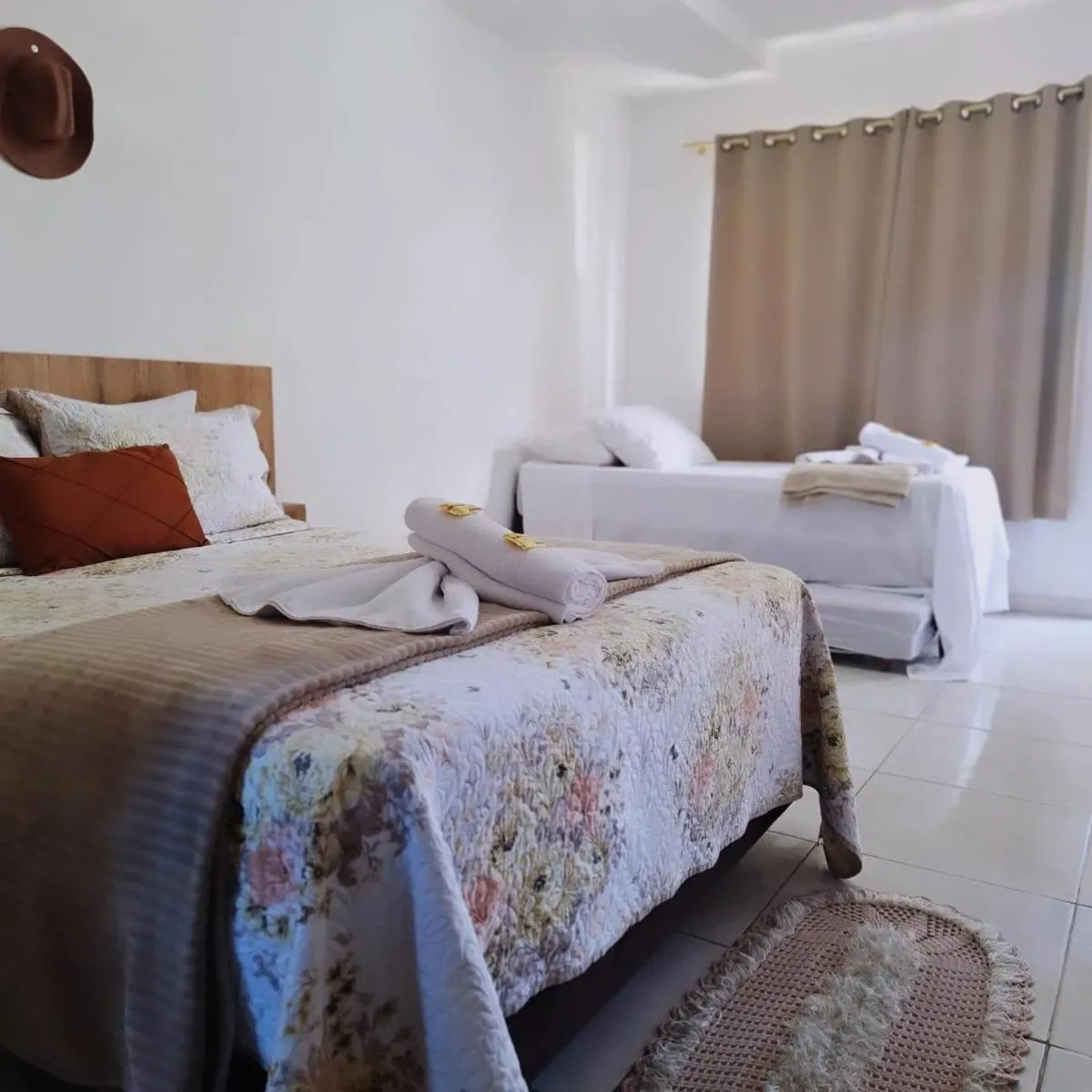 Bed in Pousada Alegria do Cowboy