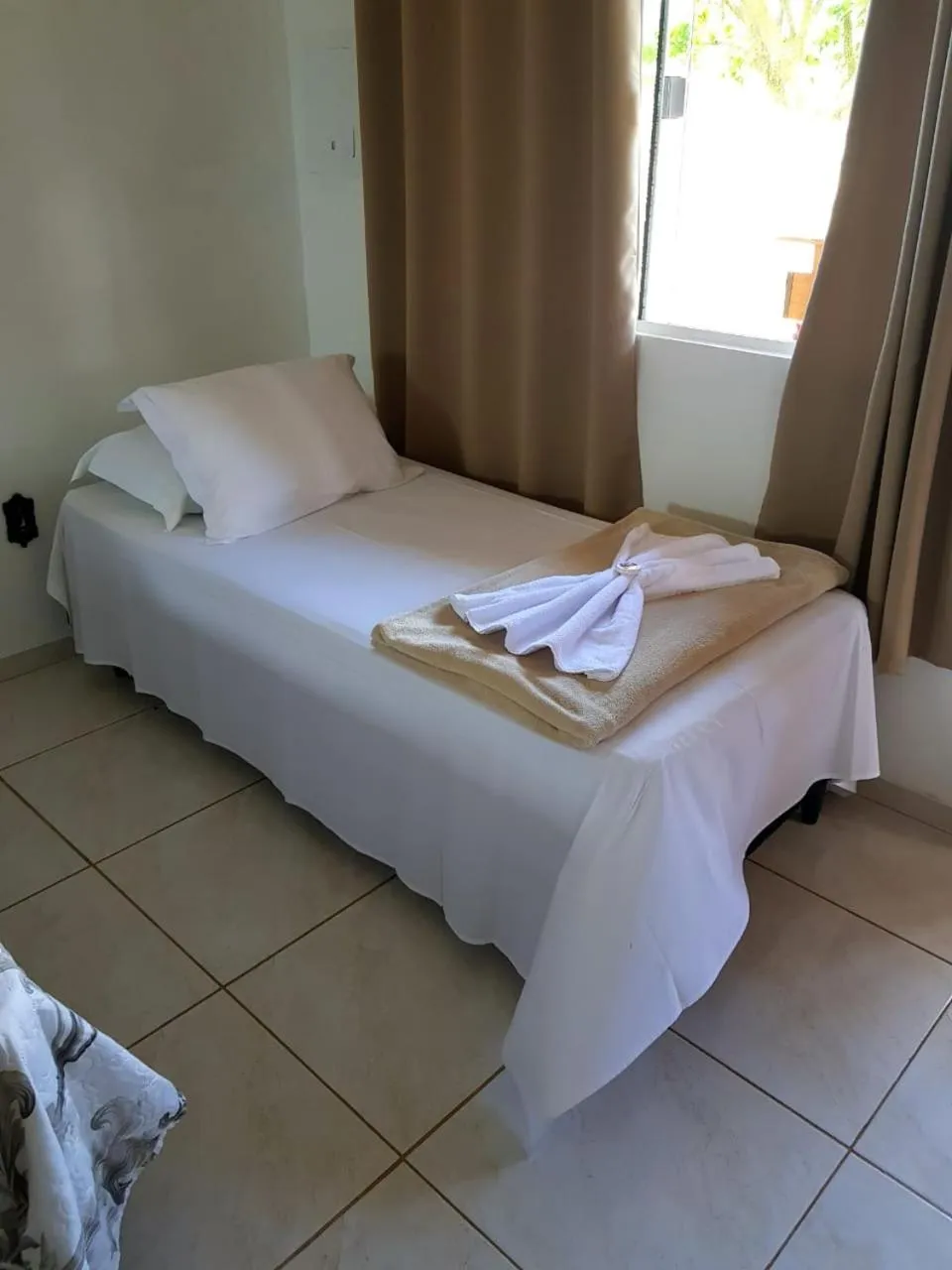 Bed in Pousada Alegria do Cowboy