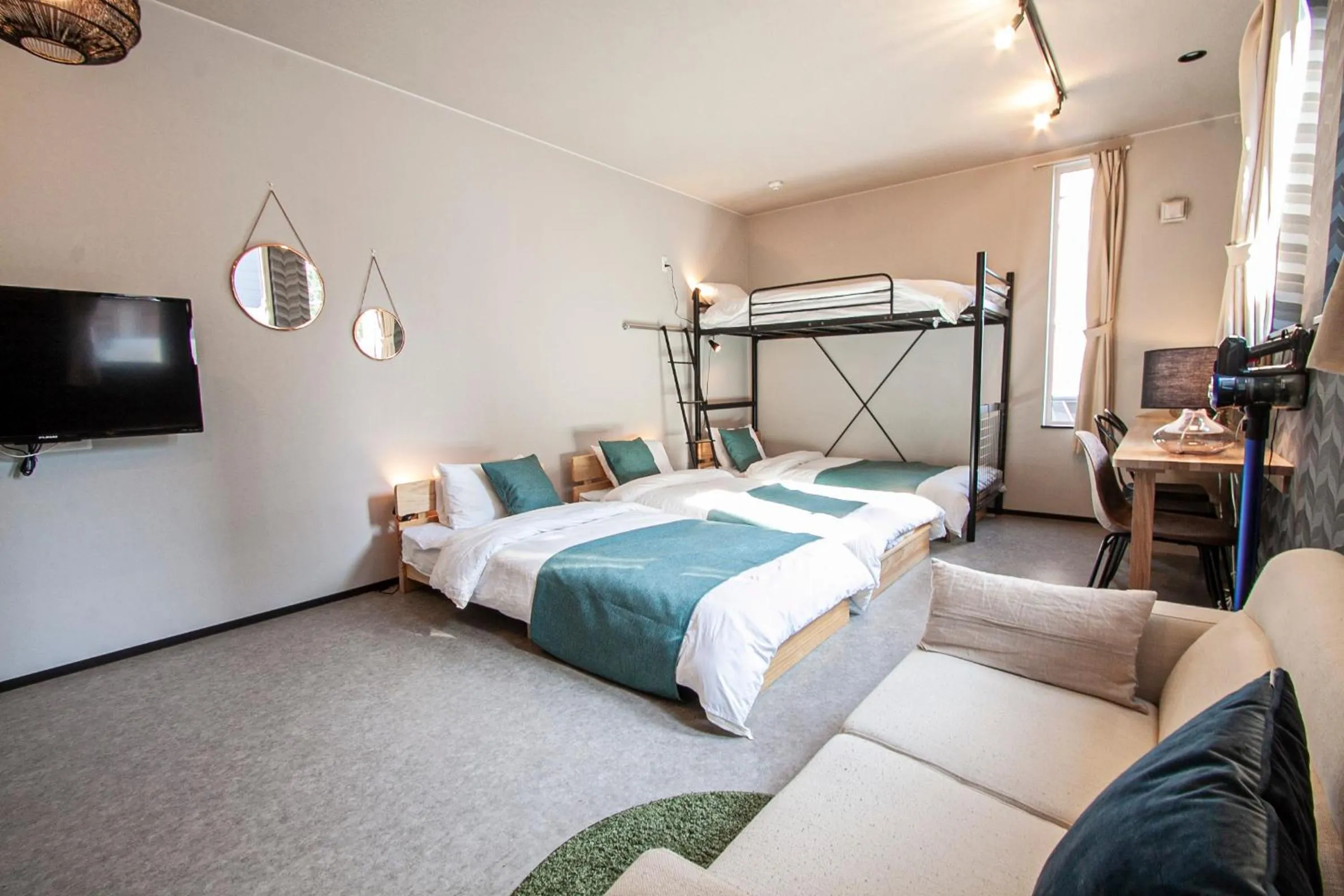 Bed in UCHI Living Stay TOYOHIRA