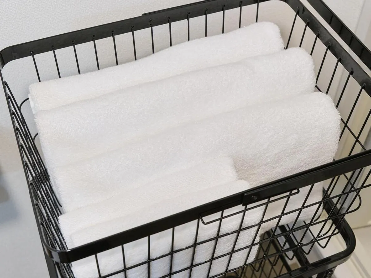 towels, Bed in UCHI Living Stay Otaru Suitengu