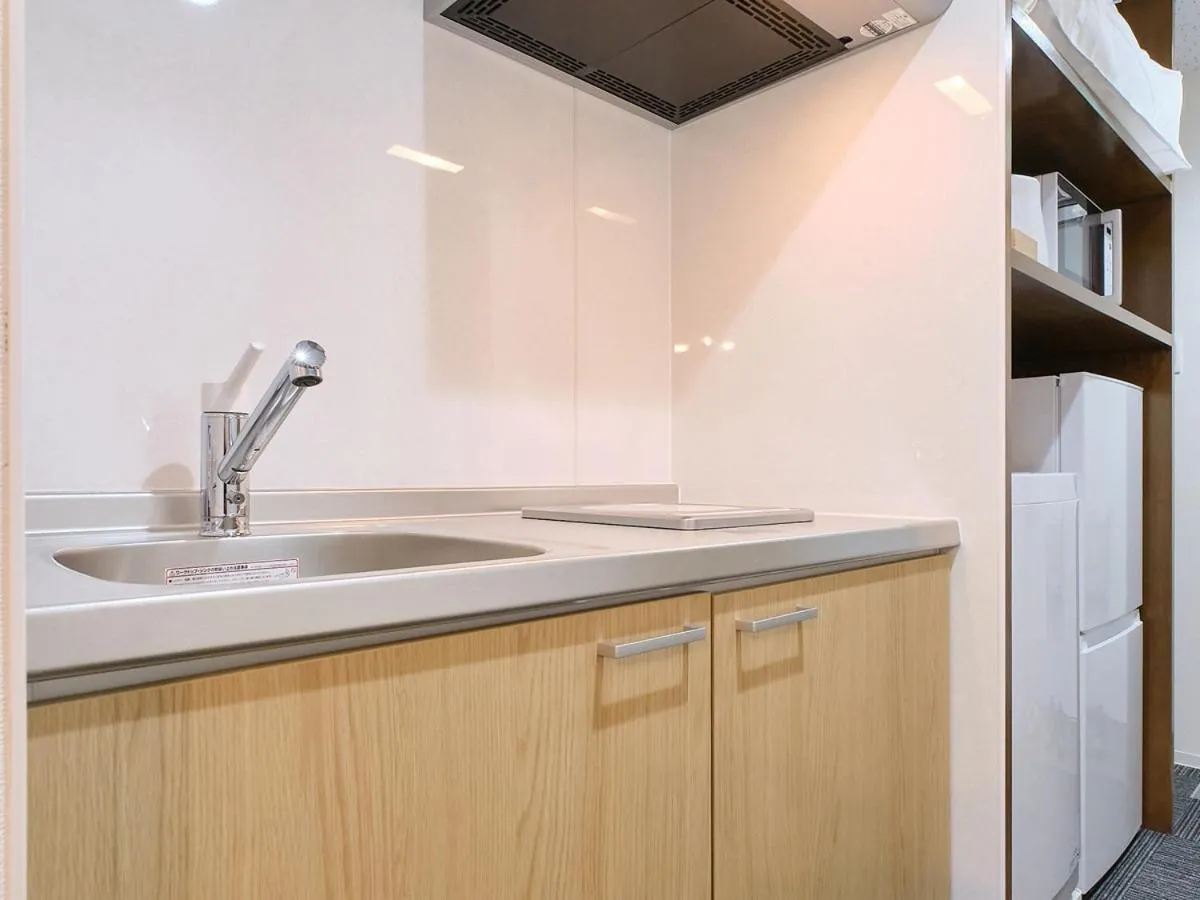 Kitchen or kitchenette in UCHI Living Stay Otaru Suitengu