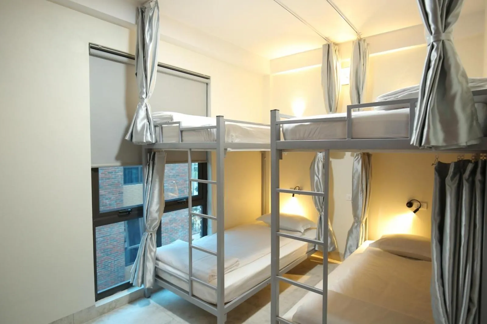 Bed in Cozynibi Hotel