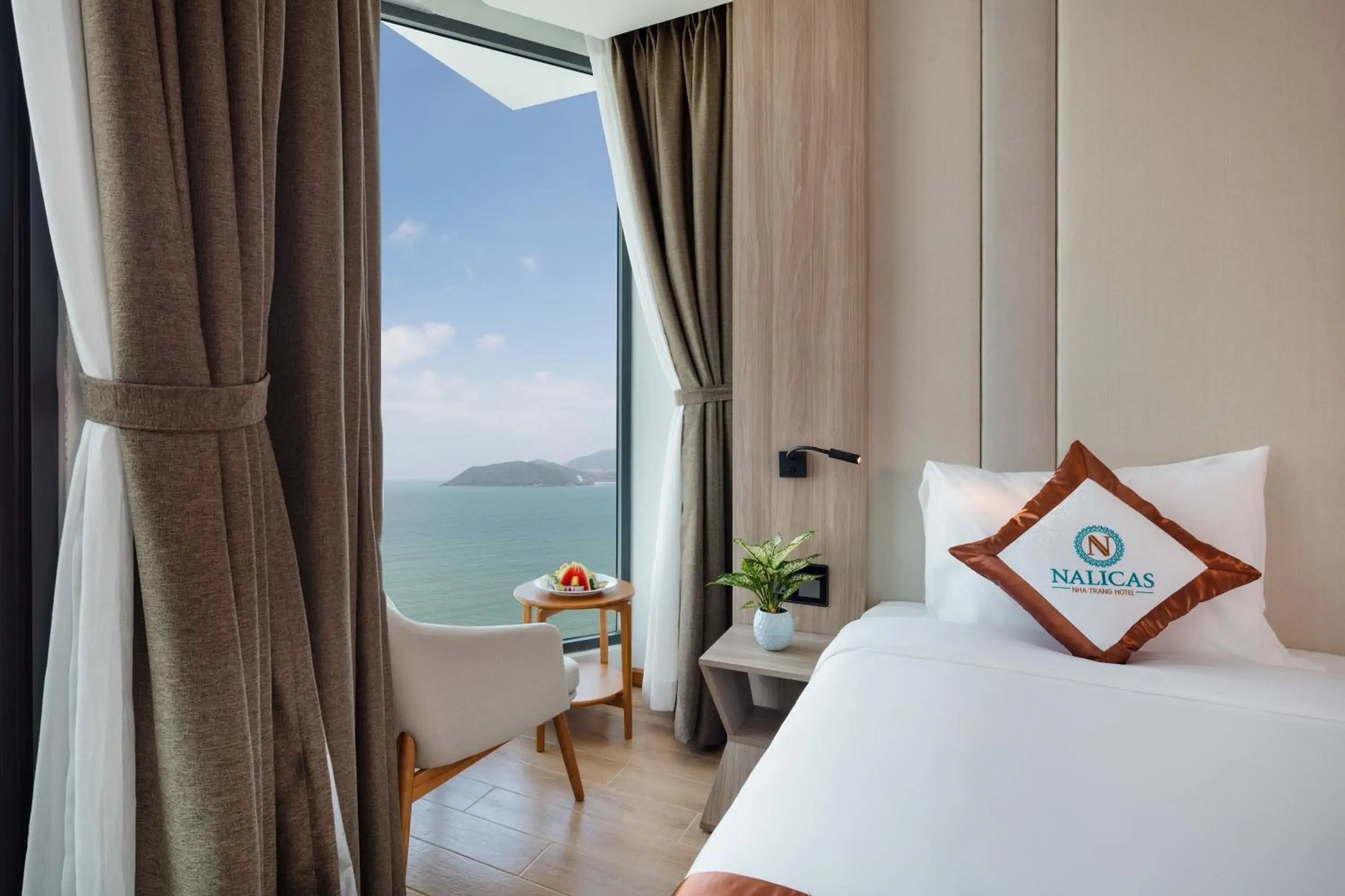 Senior Double or Twin Room with Balcony & Partial Sea View in Nalicas Nha Trang Hotel Senior Double or Twin Room with Balcony & Partial Sea View in Nalicas Nha Trang Hotel