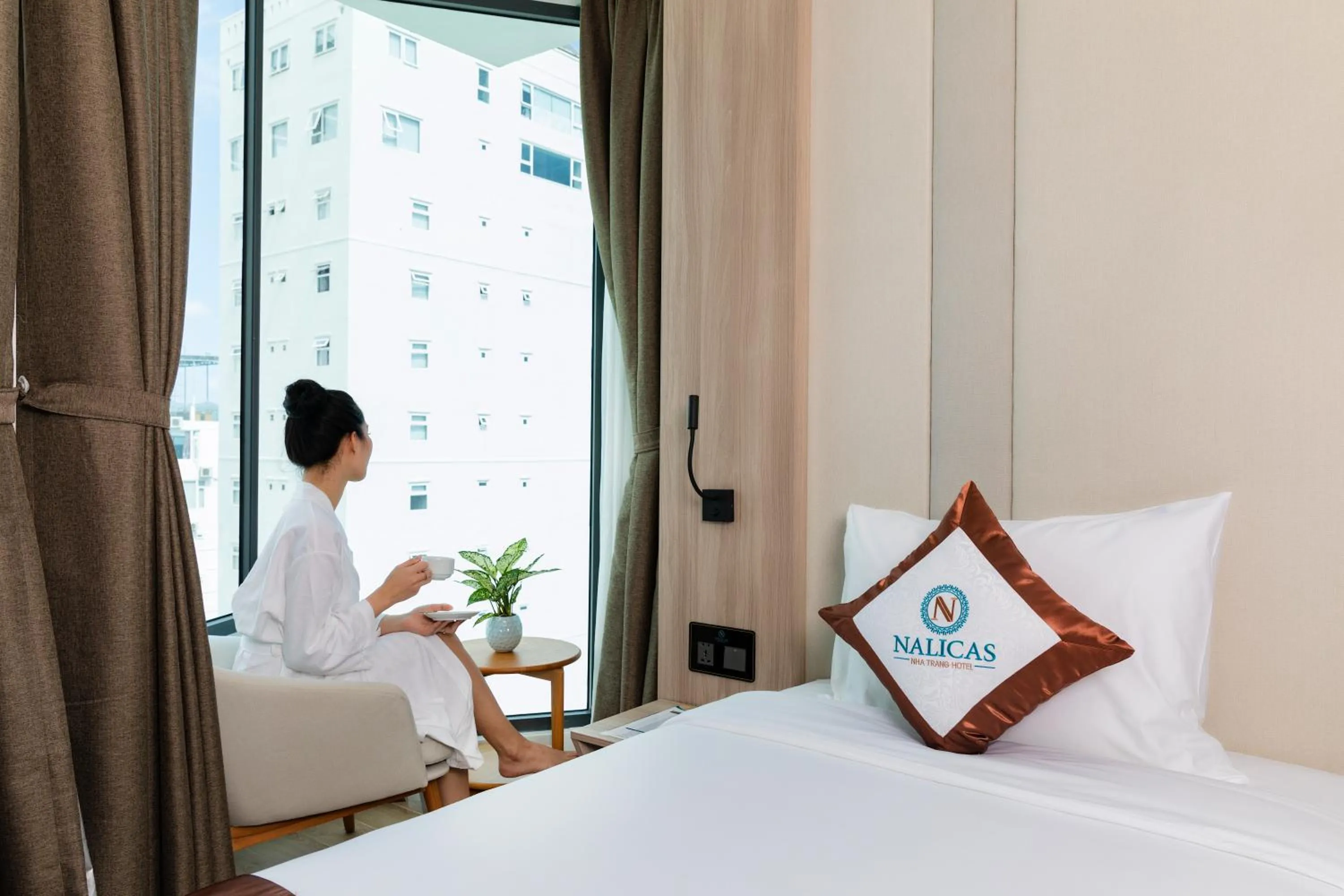 People, Bed in Nalicas Nha Trang Hotel