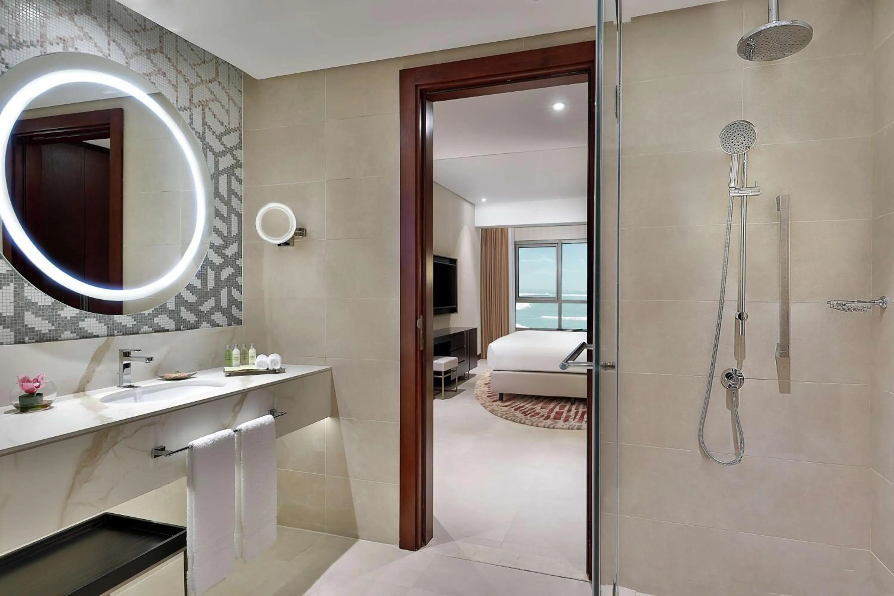 Bathroom, Bed in Hilton Doha The Pearl