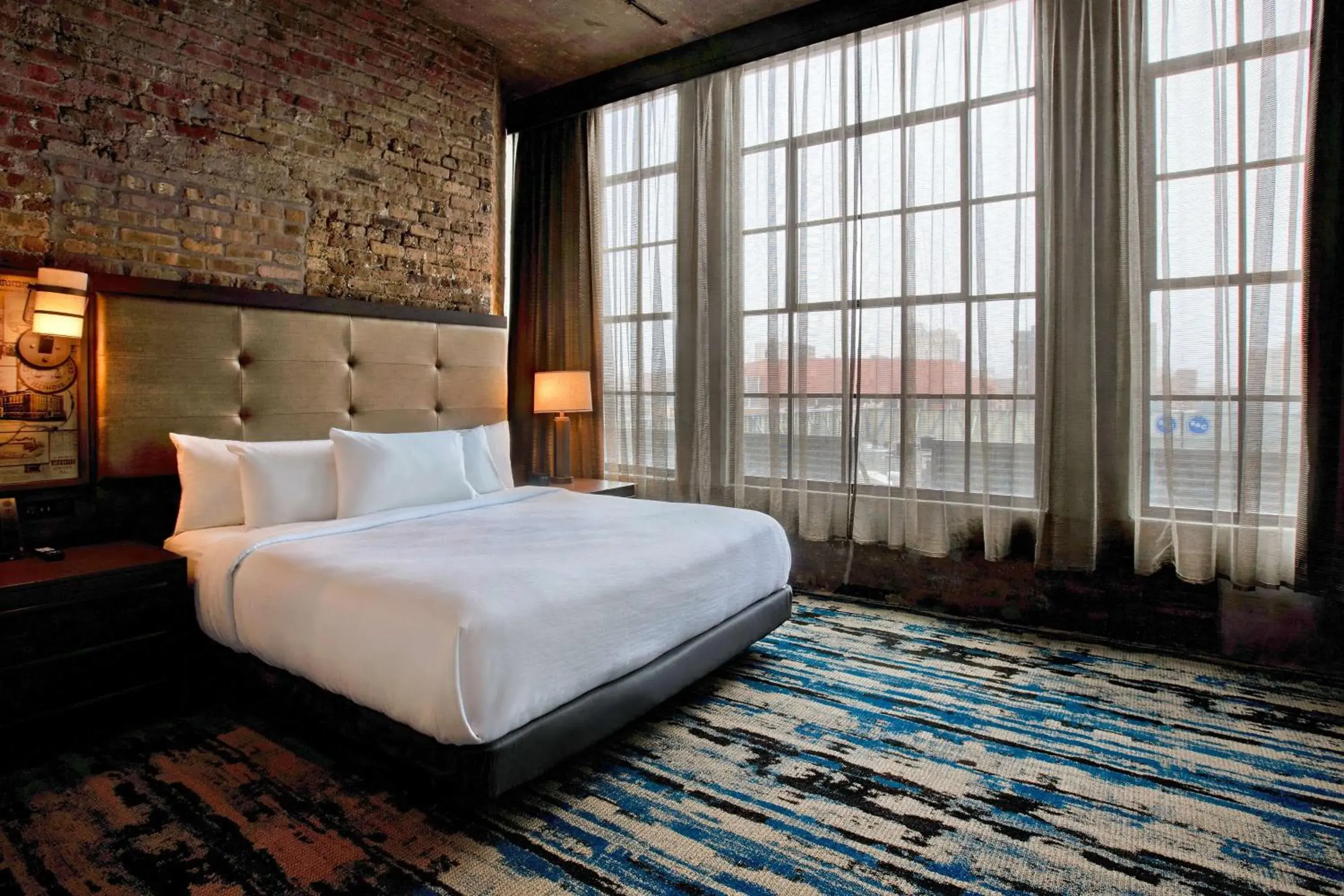 One-Bedroom King Suite with Roll-In Shower - Mobility Access/Non-Smoking in Embassy Suites By Hilton Rockford Riverfront One-Bedroom King Suite with Roll-In Shower - Mobility Access/Non-Smoking in Embassy Suites By Hilton Rockford Riverfront