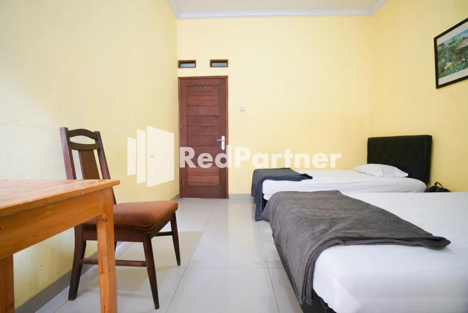 Bedroom, Bed in Surabaya Jaya Hotel near Soekarno Hatta Airport Redpartner