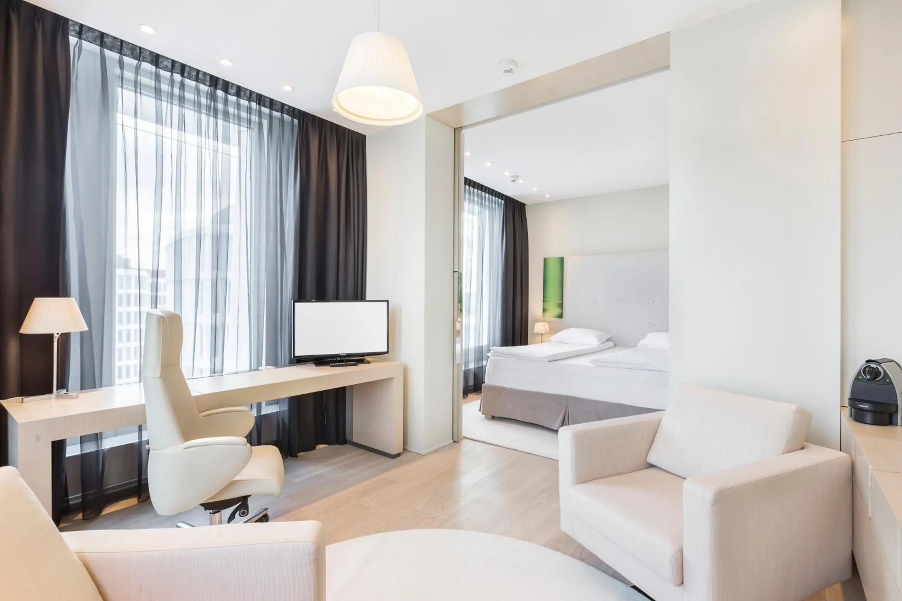 Living room, Bed in Sound Garden Hotel Airport