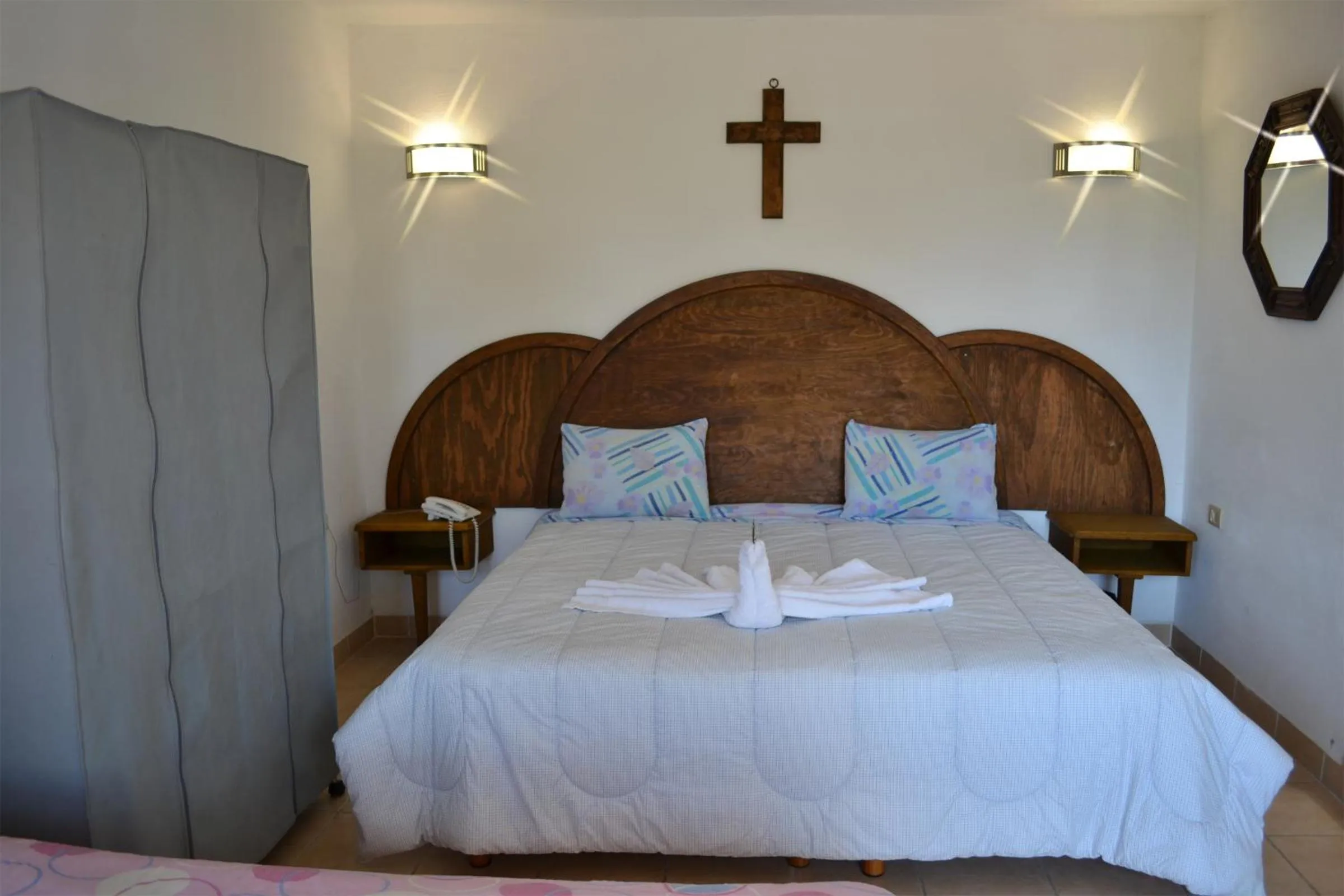 Bed in Hotel Hacienda Xico Inn