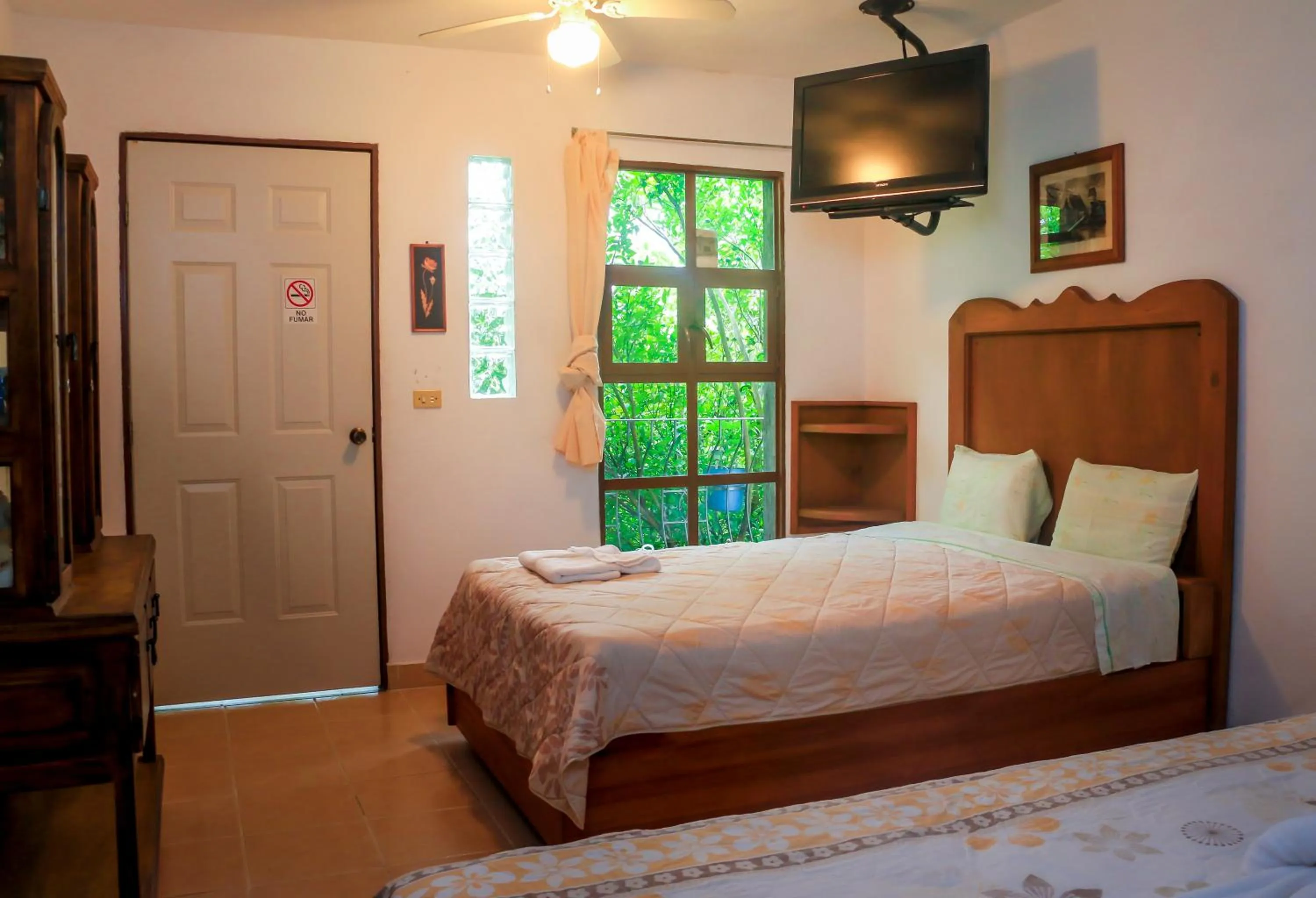 Bed in Hotel Hacienda Xico Inn