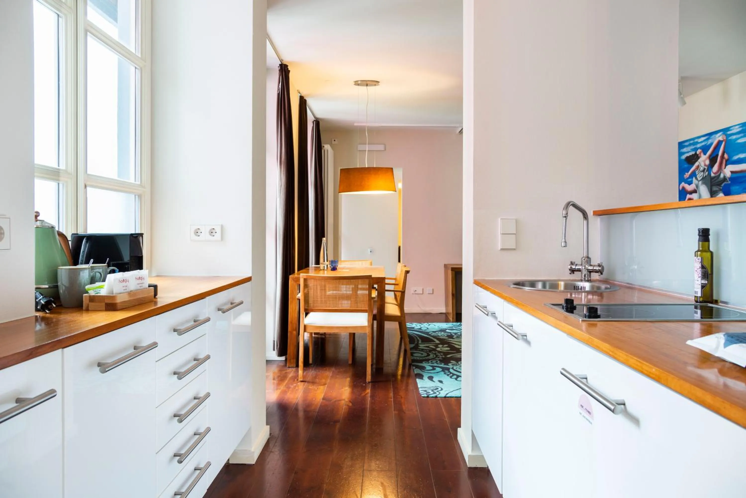 Kitchen or kitchenette in Numa Berlin Belfort