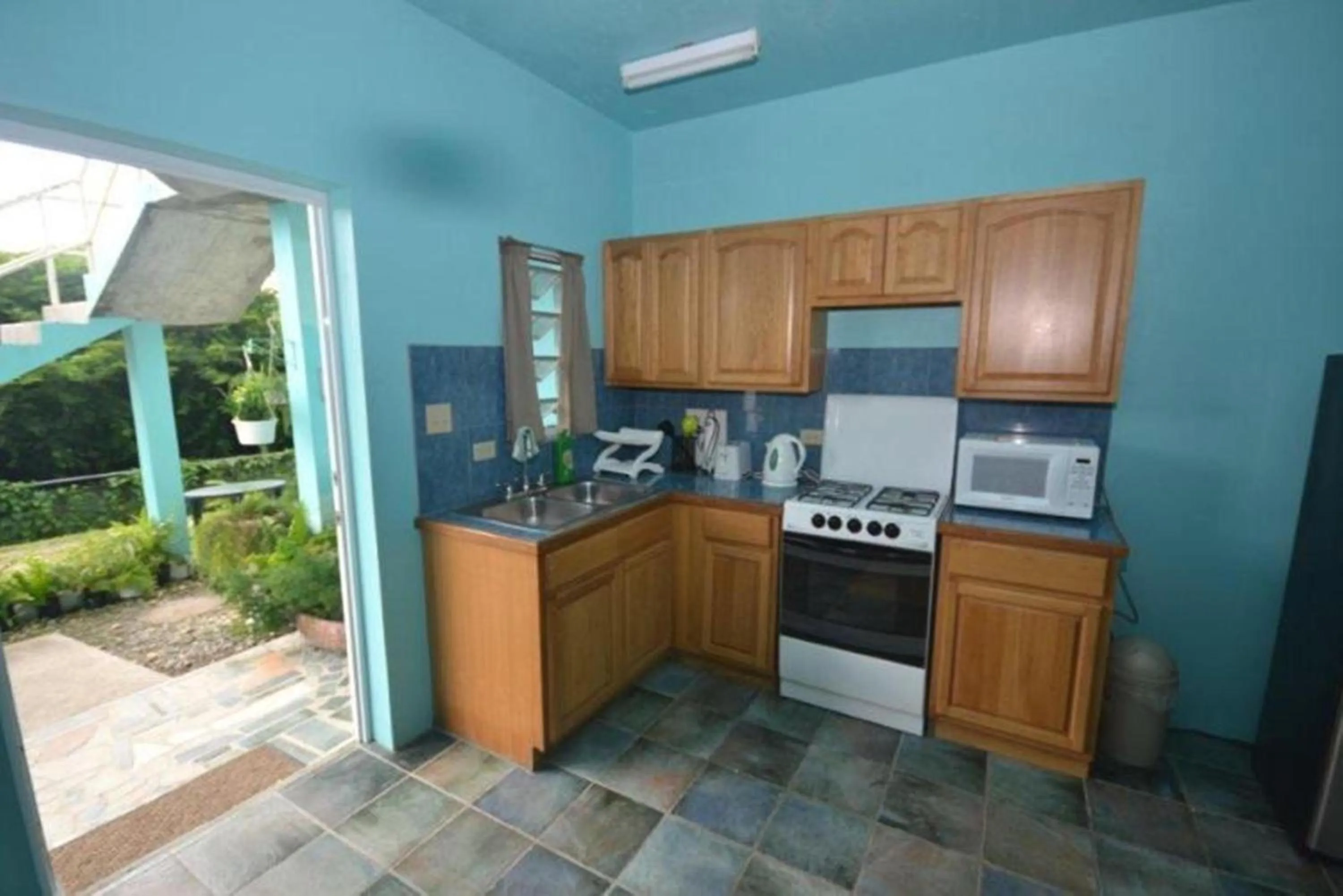 Kitchen or kitchenette in Lamblion Holiday Apartment