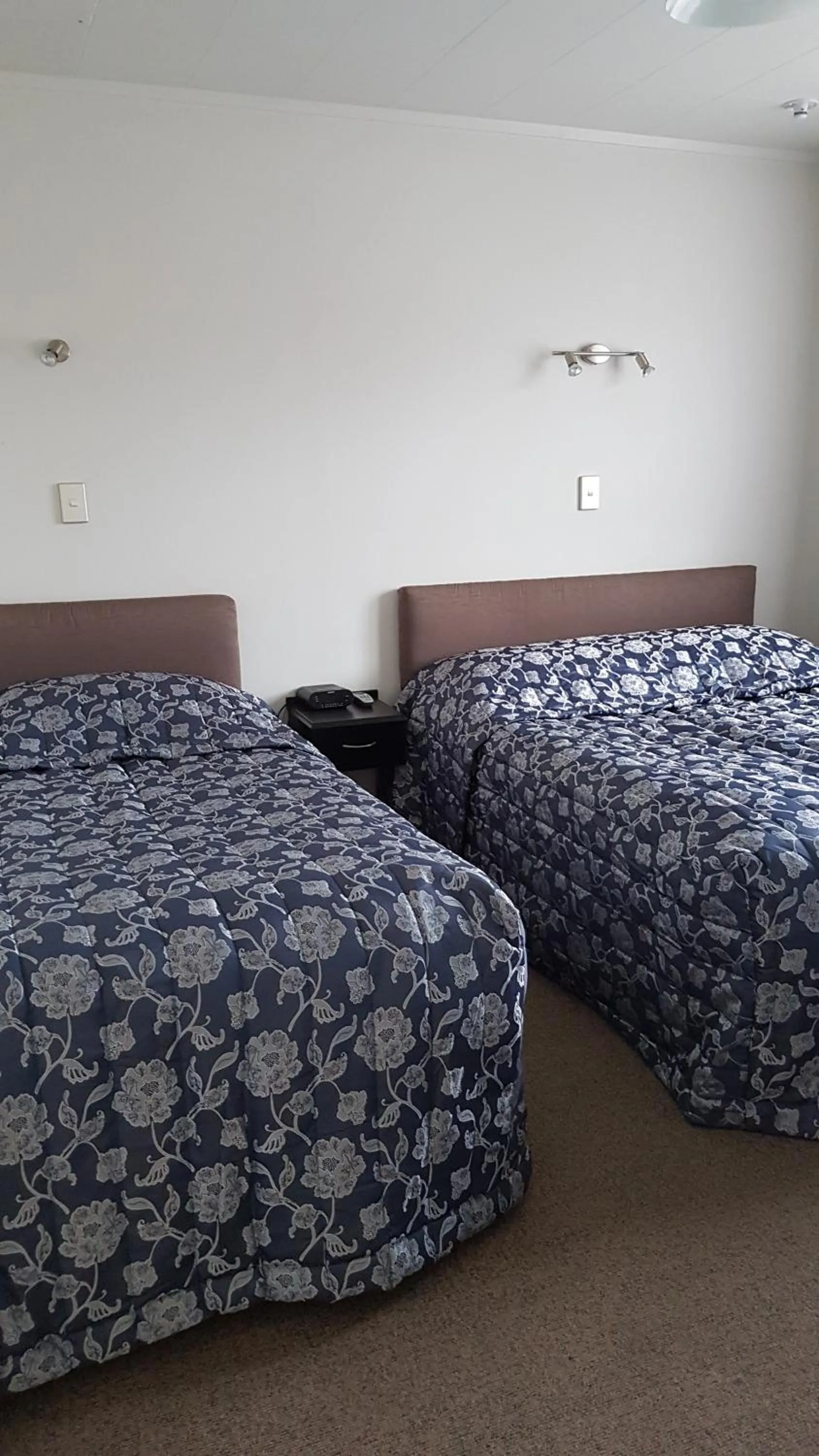 Bed in Coachman Motel